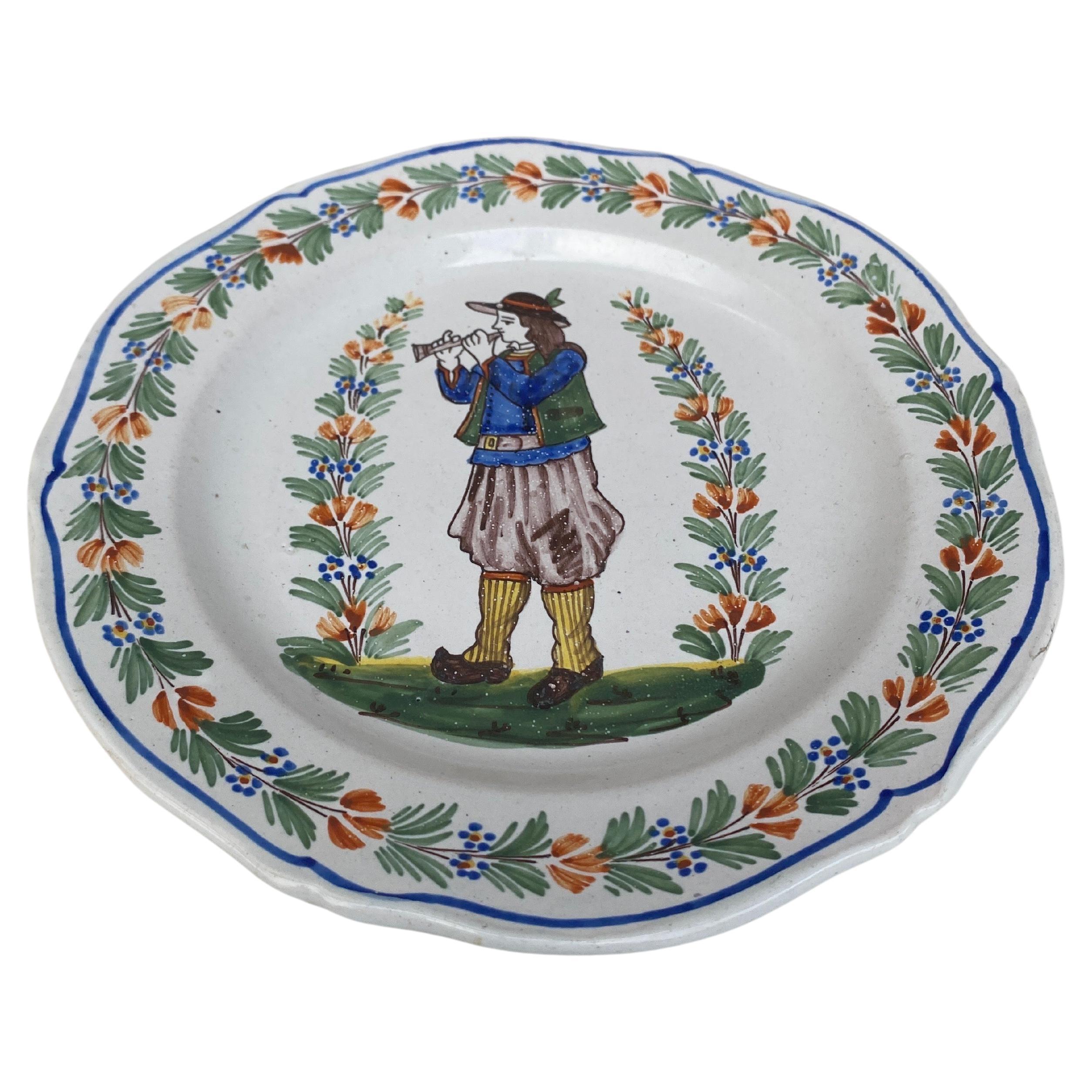 French Faience Plate Henriot Quimper Circa 1900.
Breton with a flute.
8 inches diameter.
 
