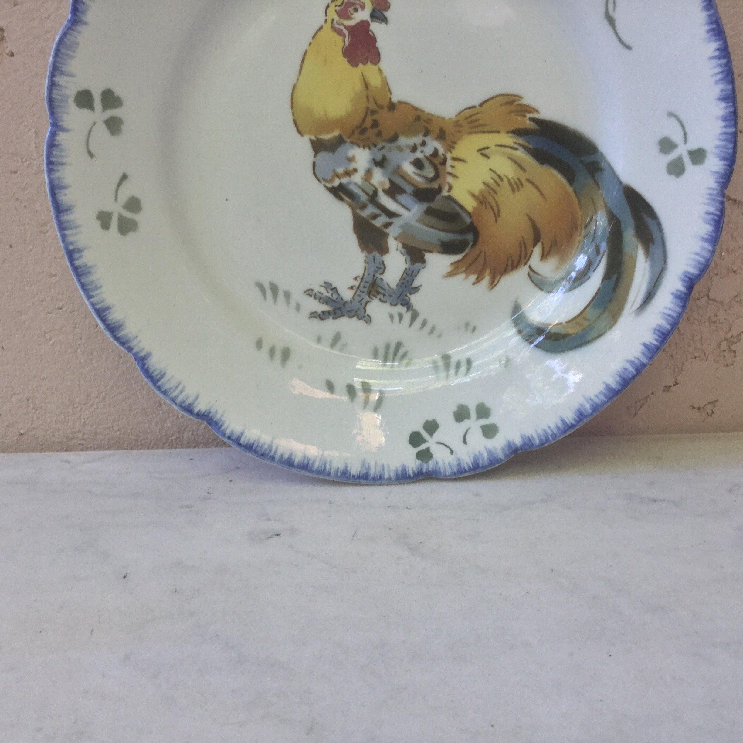 French faience rooster plate Keller & Guerin Luneville, circa 1900.
Decorated with clovers.