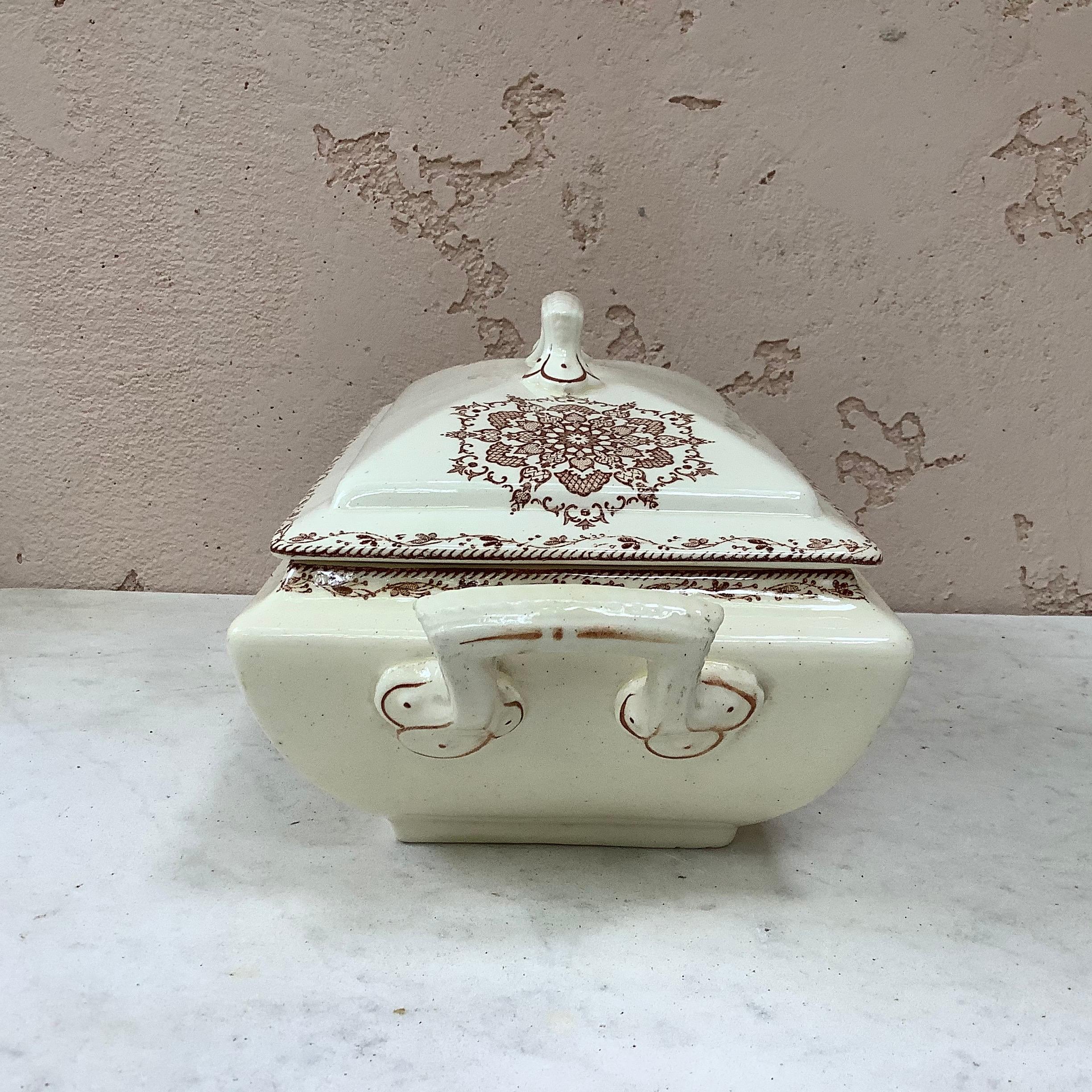 French faience covered dish signed Salins, circa 1890.
Decorated with snowflakes.