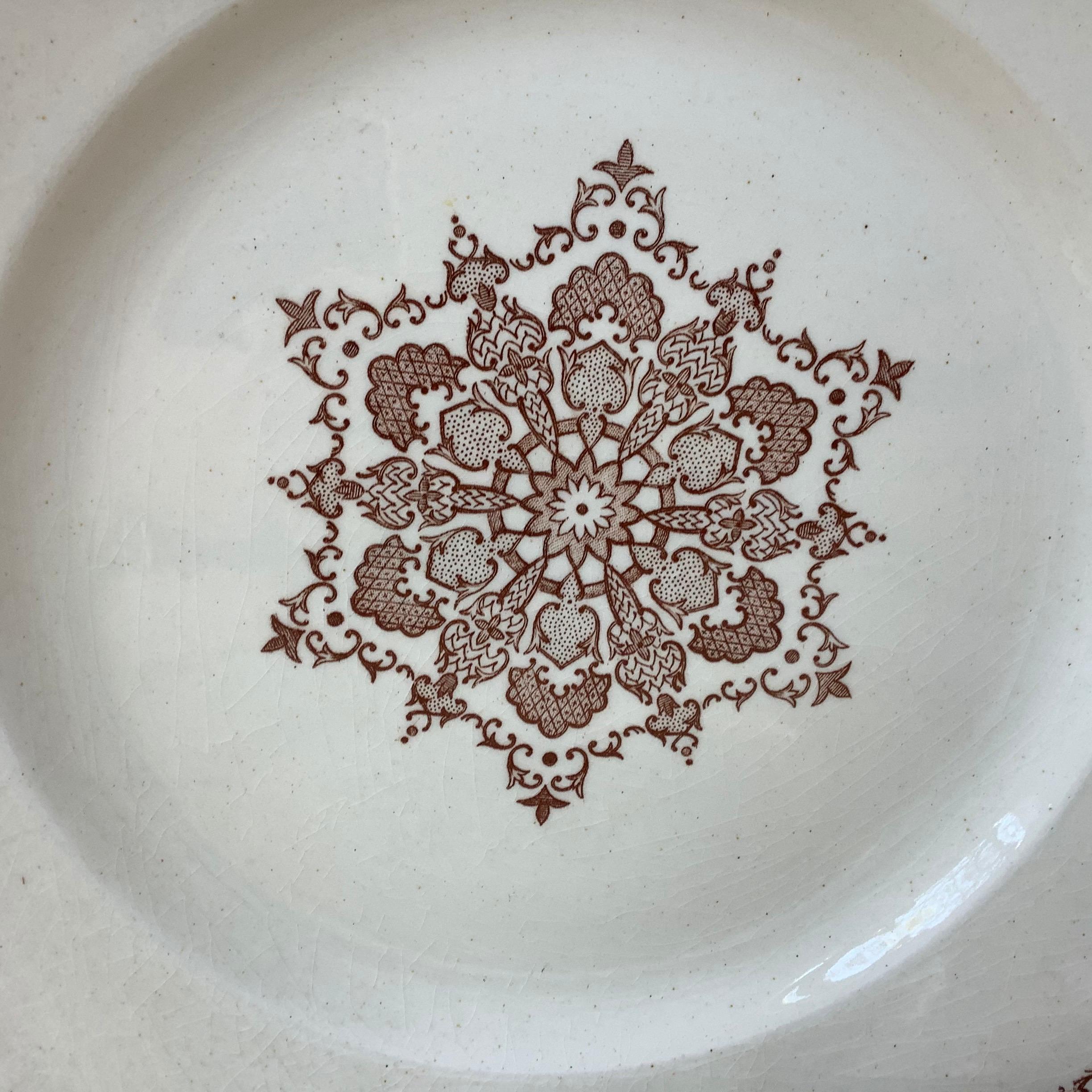 French faience dinner plate signed Salins, circa 1890.
Decorated with snowflakes.
4 plates are available.