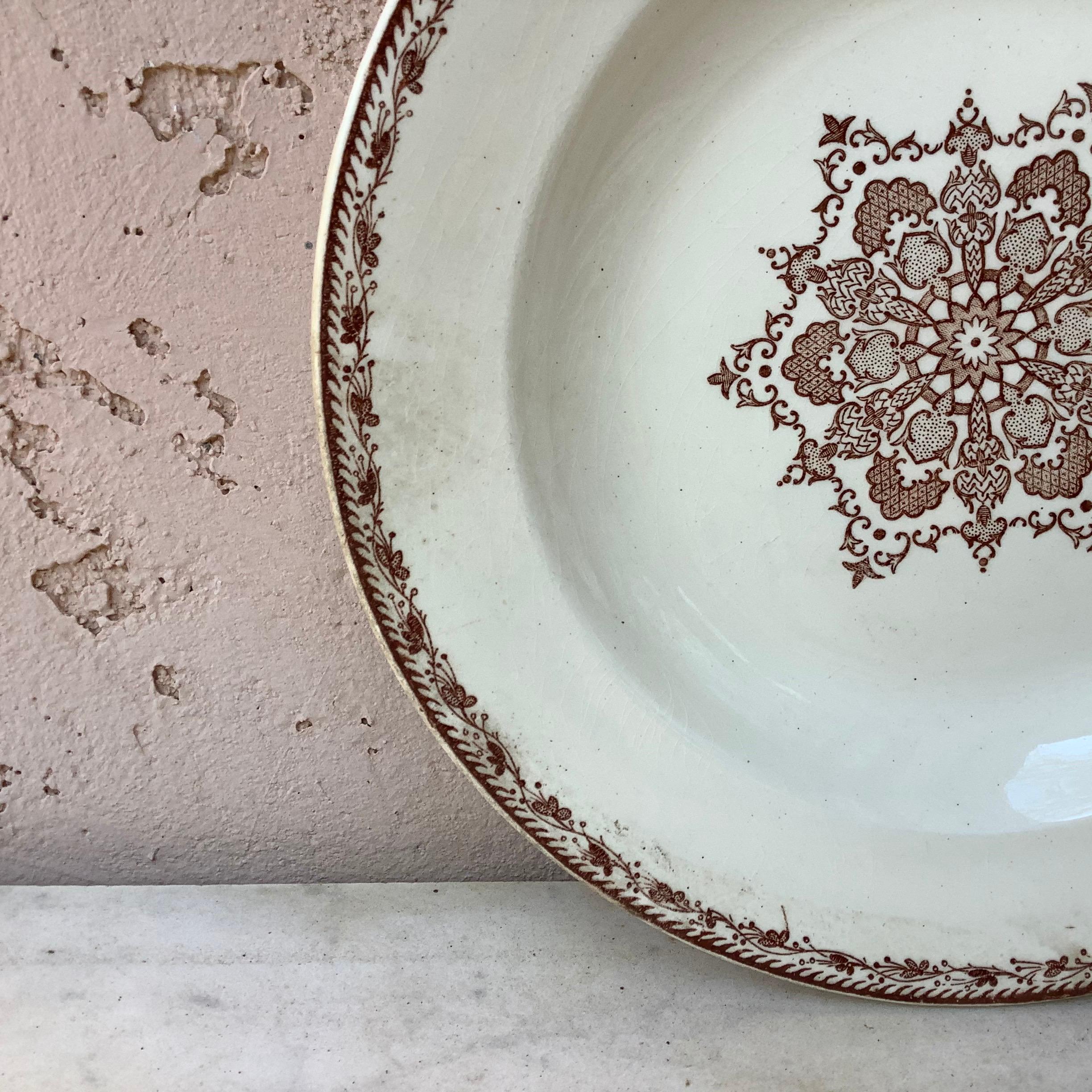 French faience soup plate signed Salins, circa 1890.
Decorated with snowflakes.
8 plates available.
