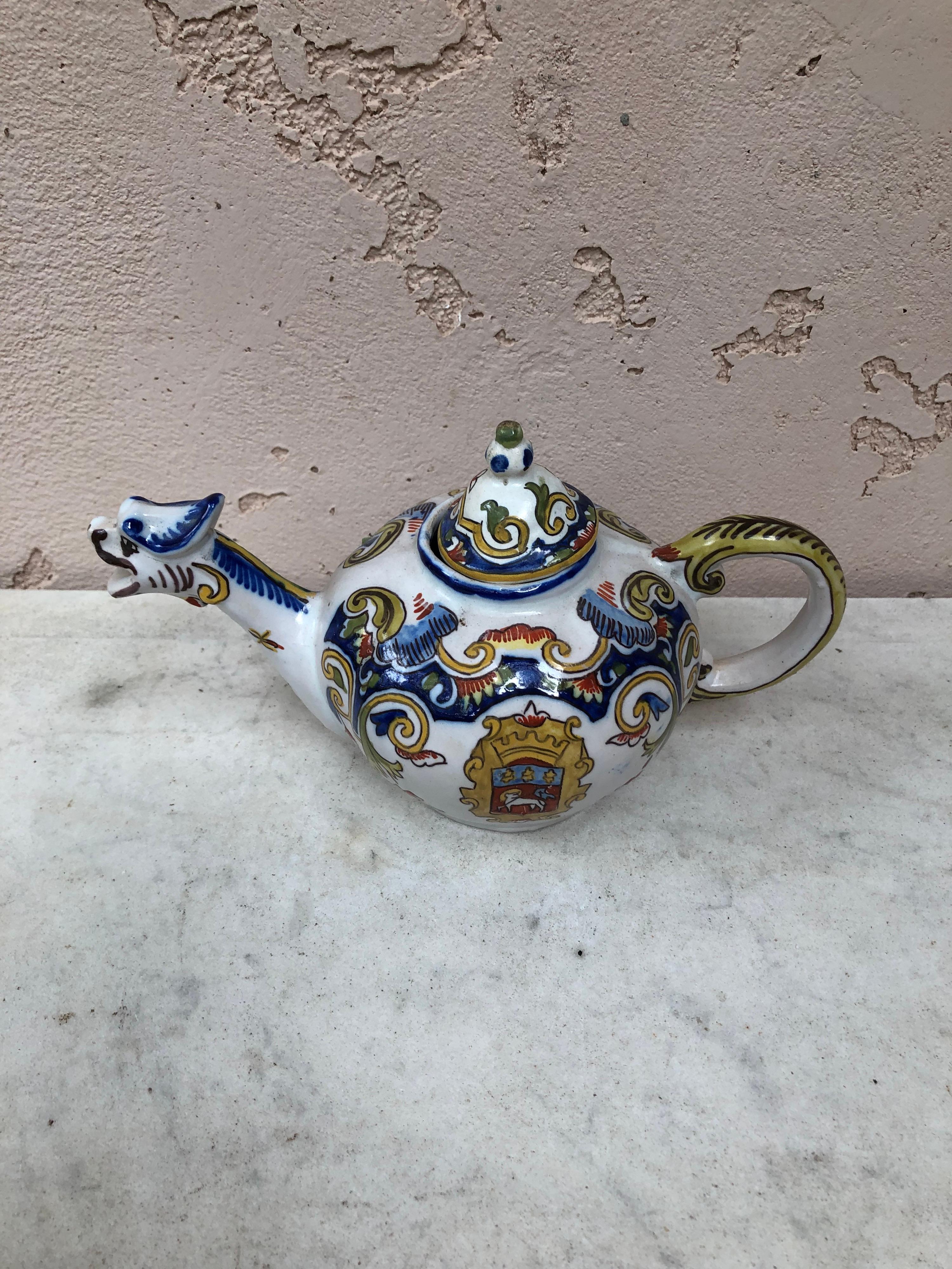 French Faience teapot Desvres, Rouen style Circa 1900.
Coat of arms and floral pattern.