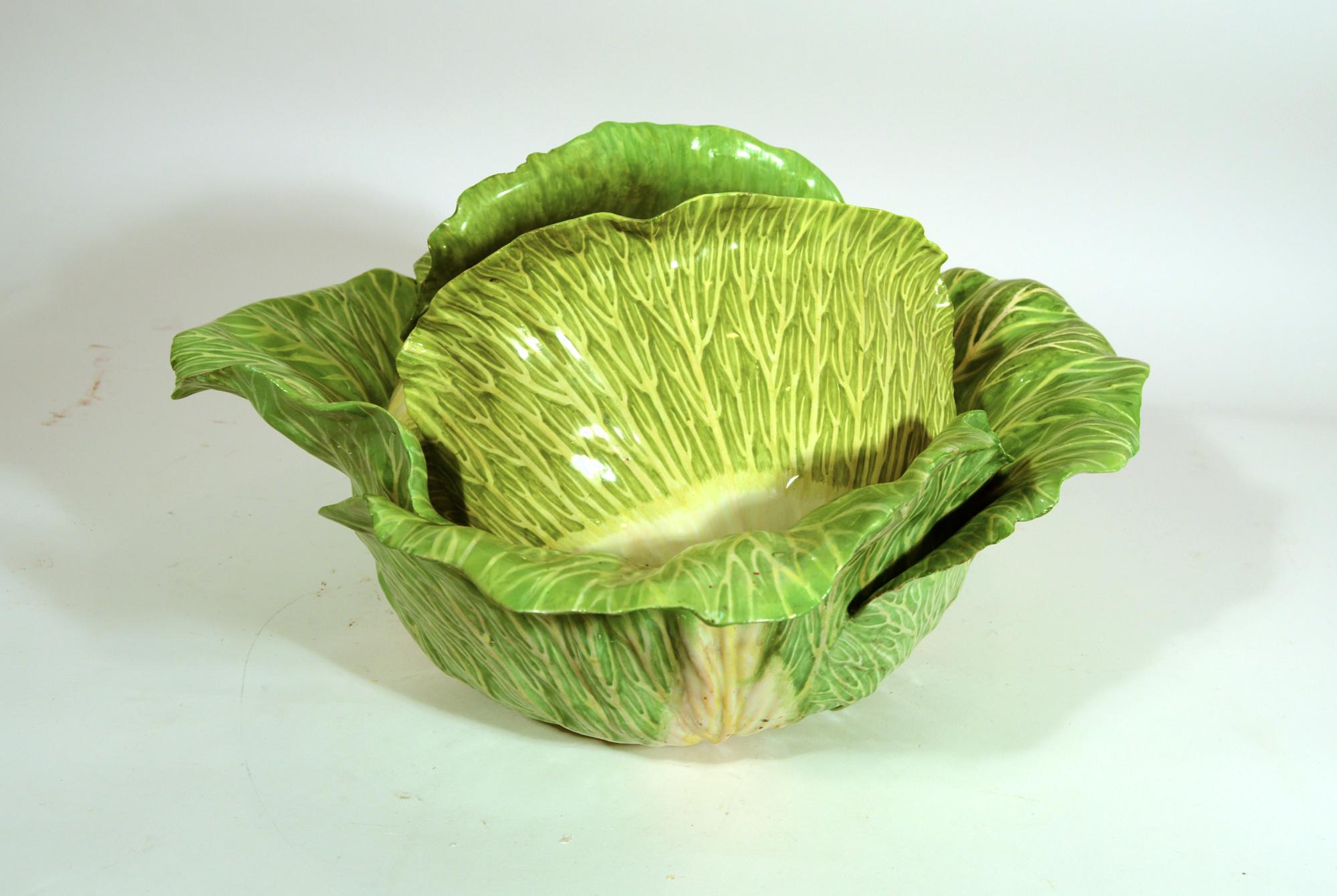 French Faience Tromp L'oeil cabbage leaf tureen & cover,
Paul-Antoine Hannong, Hannong Factory, Strasbourg, Alsace, France.
1748-1754

The massive (17 1/2 inches across) tureen is in the form of a large cabbage naturalistically modeled and