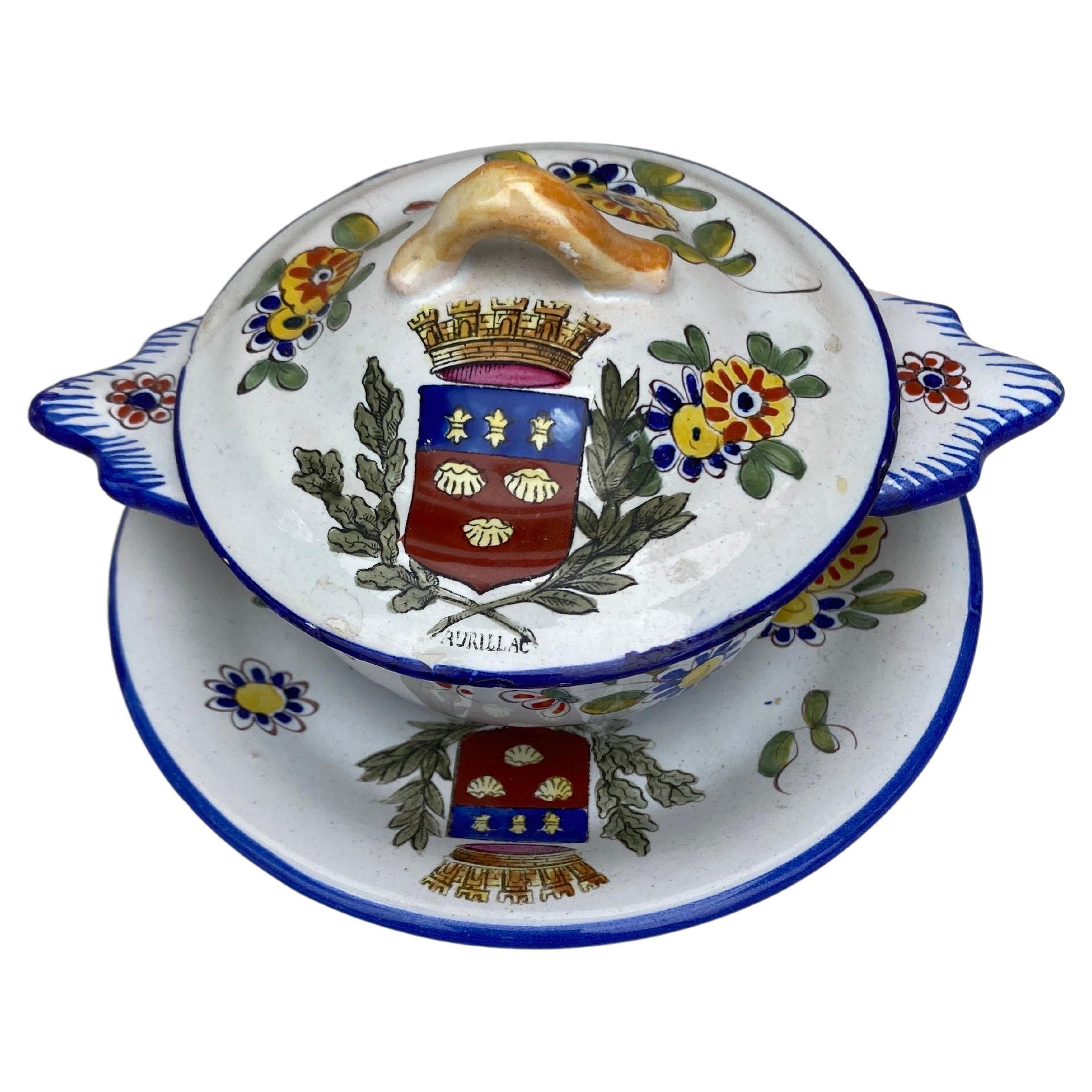 French Faience Tureen Keller & Guerin Saint Clement Circa 1900.
Small tureen with plate decorated with flowers and coat of arms Aurillac.
Measures: Plate / diameter 5.4