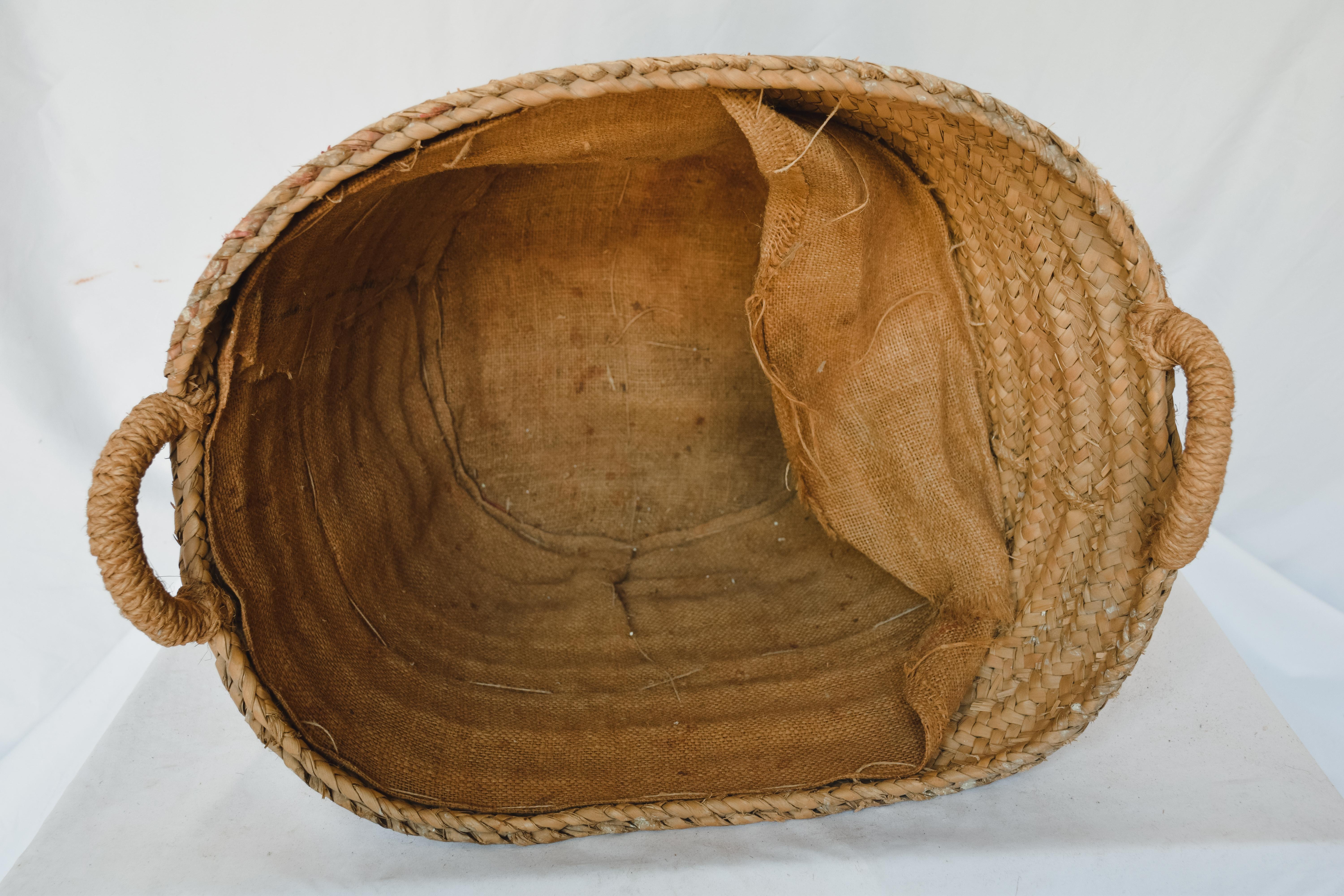 This is a beautifully weaved rustic French farm basket. The farm baskets were used in the open market places in France to display flowers, vegetables, fruits and bread goods. These baskets are not only beautiful, but they are very useful. Imagine