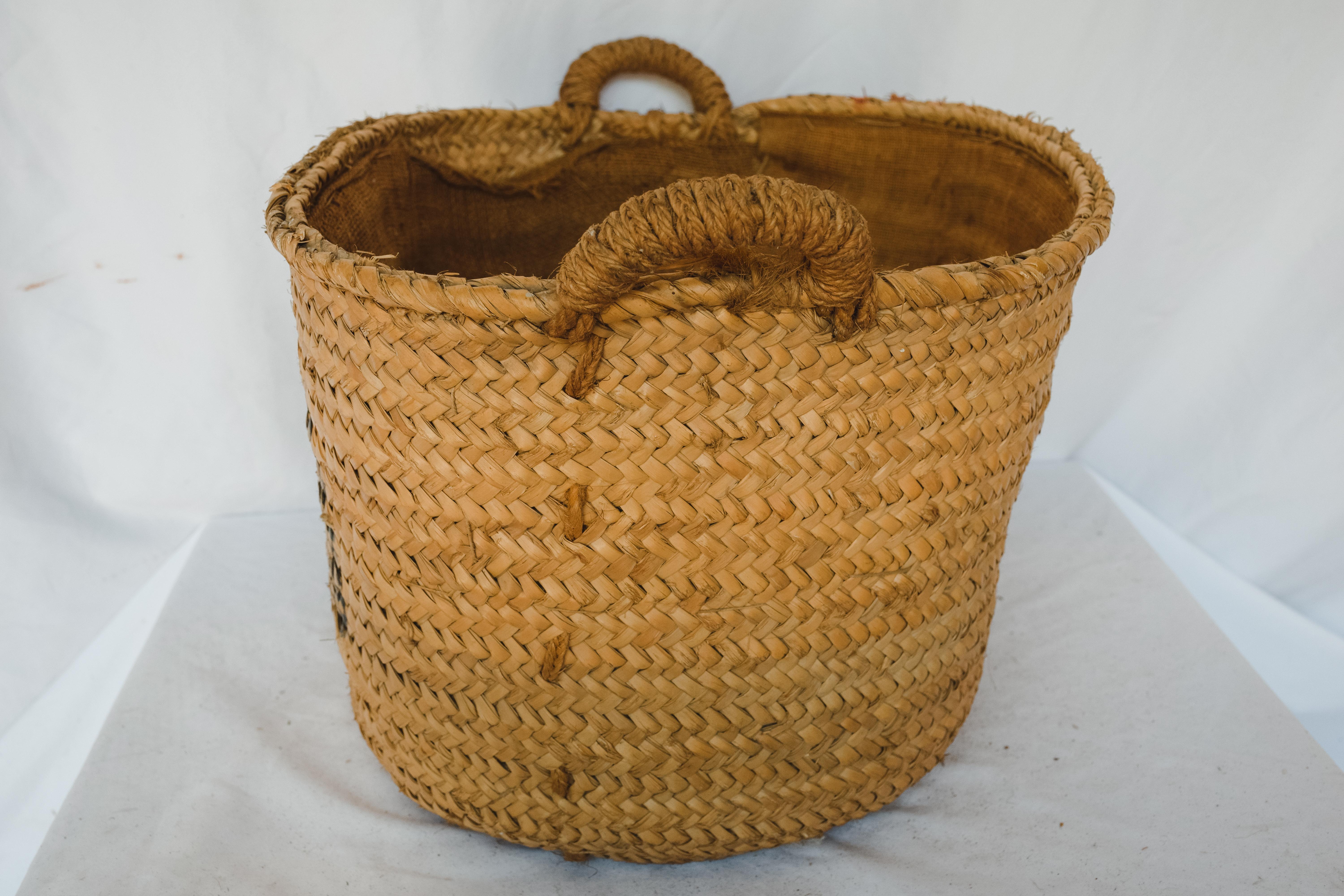 This is a beautifully weaved rustic French farm basket. The farm baskets were used in the open market places in France to display flowers, vegetables, fruits and bread goods. These baskets are not only beautiful, but they are very useful. Imagine