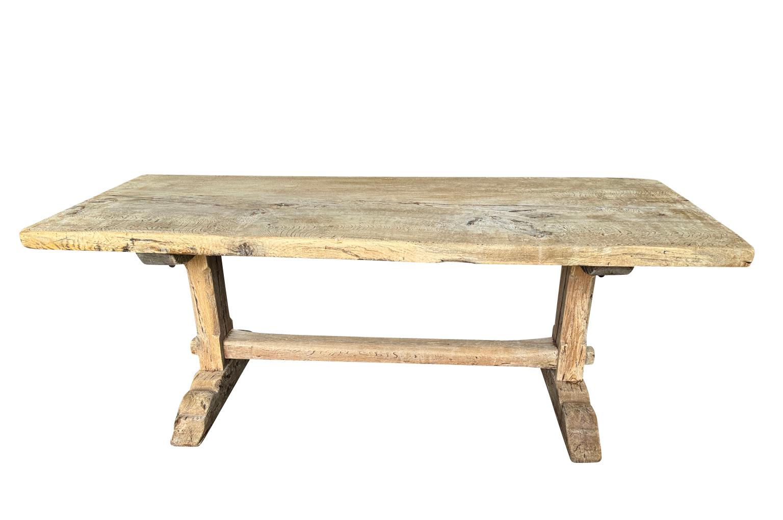 A charming late 19th - early 20th century Farm Table from the South of France.  Soundly constructed from oak.  Serves beautifully as a kitchen table or as a writing desk.