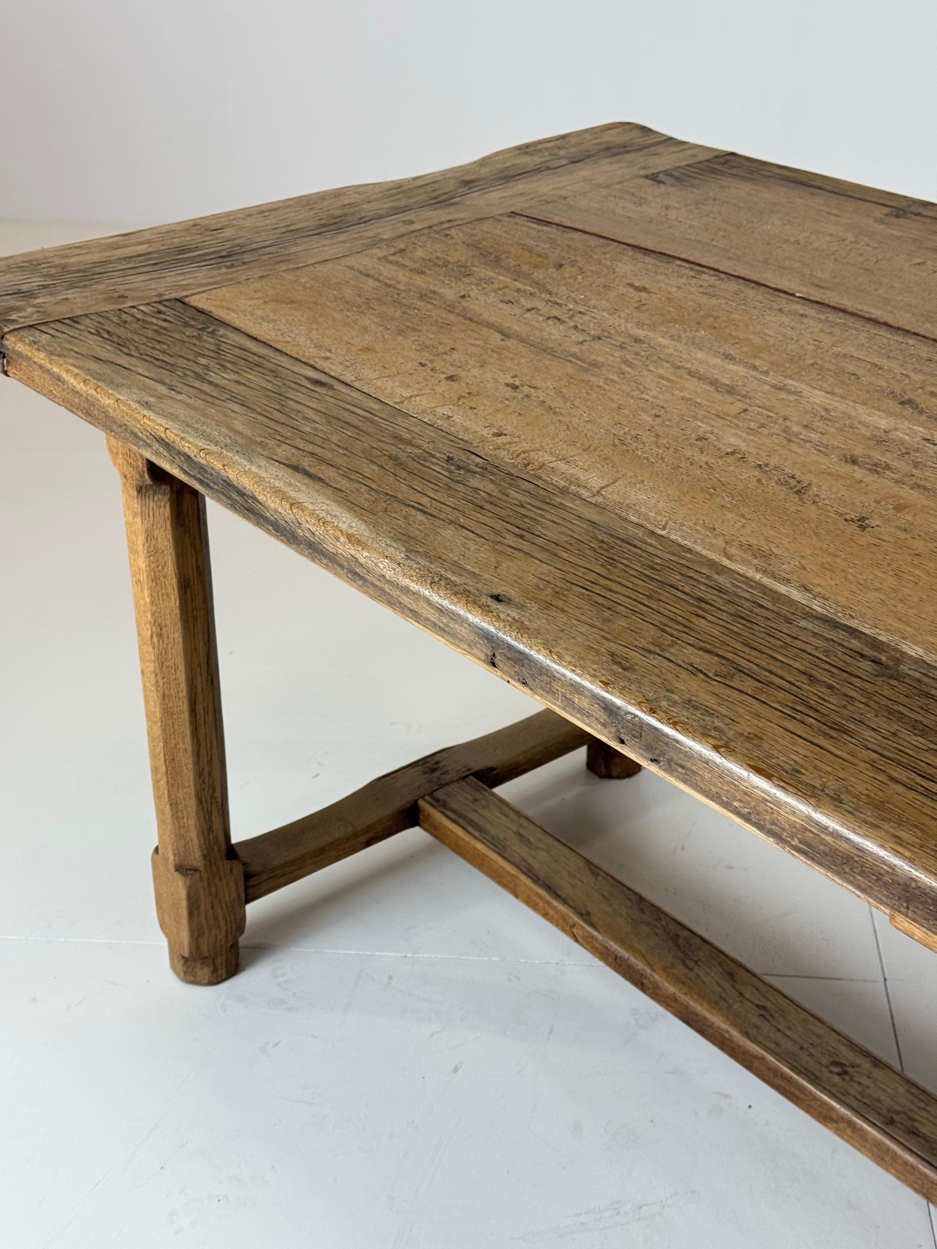 Fantastic large farmhouse dining table / monastery table. Early 20th century. Made of solid oak. With a drawer on long side.

Very solid and sturdy. Robust appearance by beautiful aged / weathered top. Country style.

Dimensions: 250L x 89W x