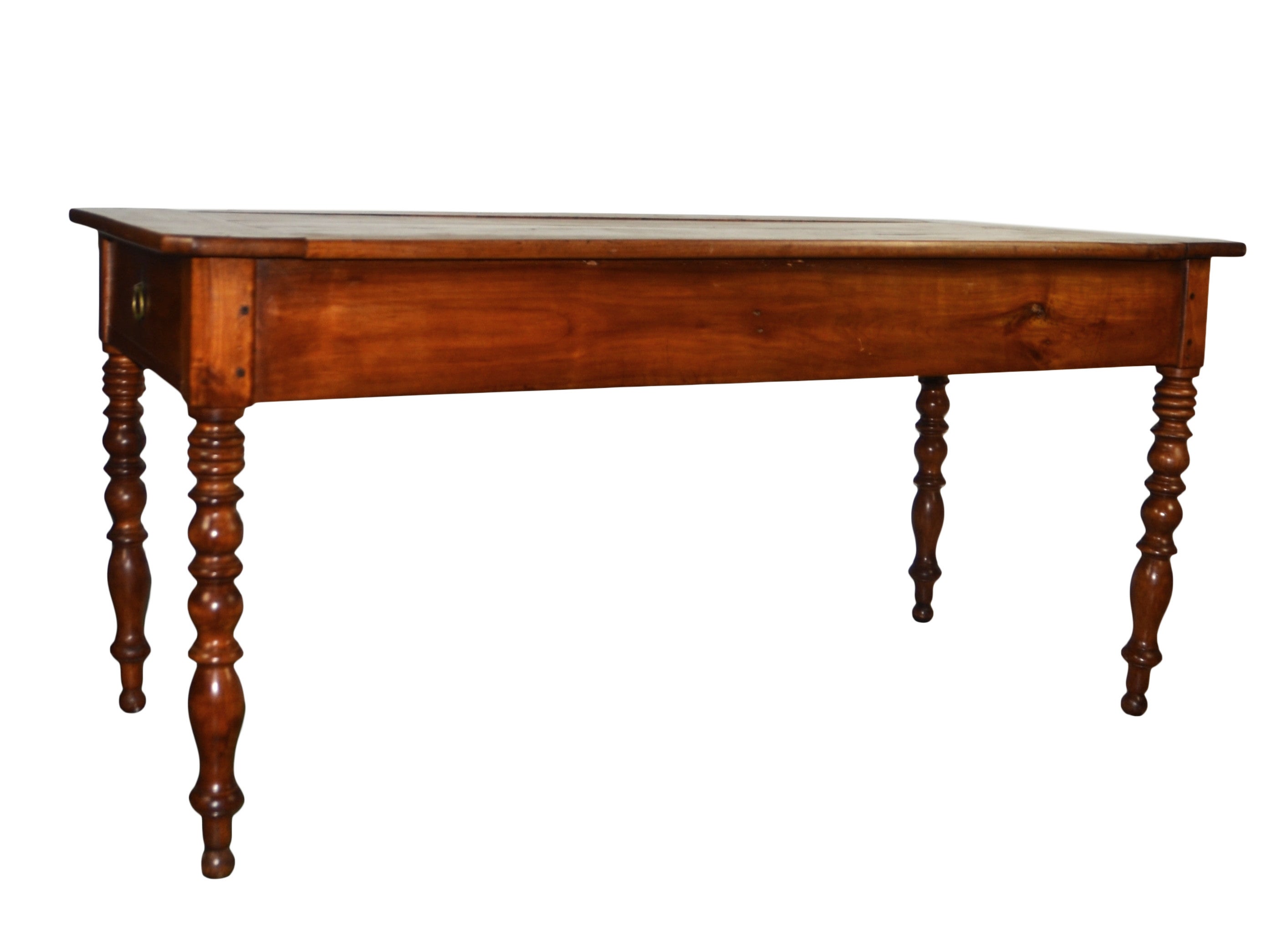 An original French Farm table in fruitwood. Exceptionally fine turned legs. Soft warm patina to the top. Drawer to each end, with original hardware and drawer liners. True survivor.