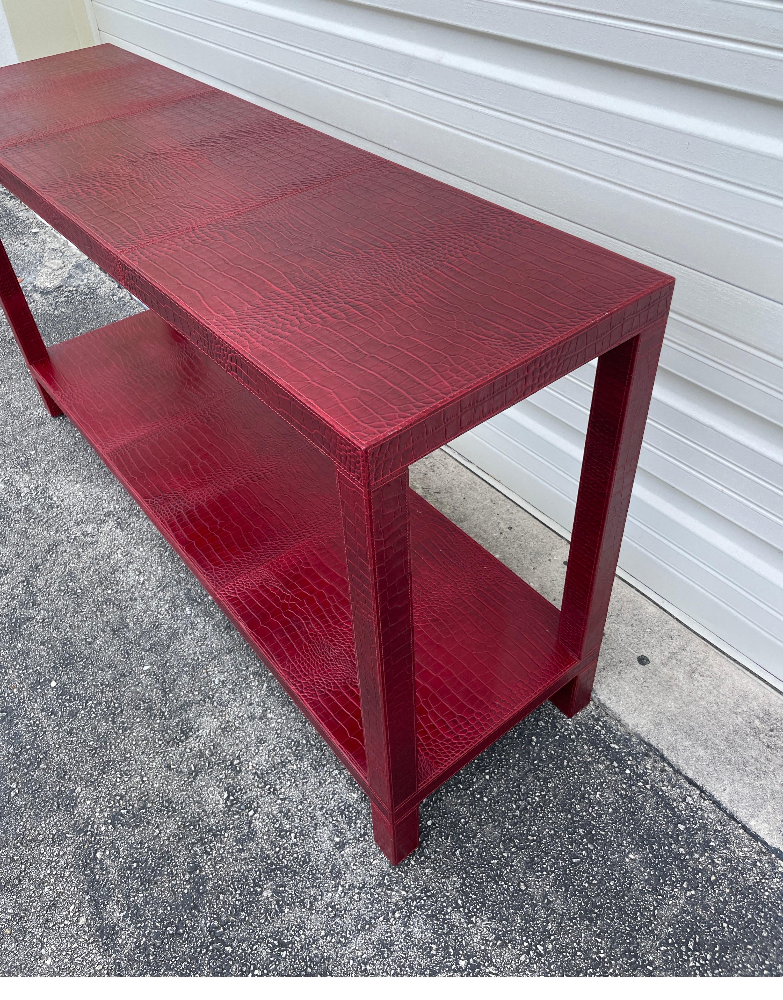 French embossed red leather alligator console / sofa table by Dominic Chambon, Paris. Circa 2000. Signed underneath with manufacturer's label.