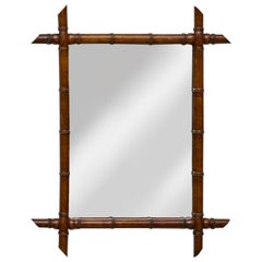 Miroir mural français en faux bambou et bois sculpté avec terminaisons d
angle pointues, années 1900