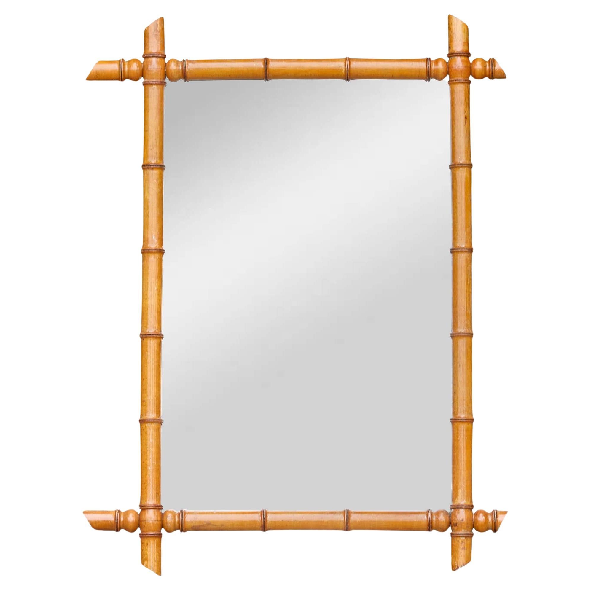 French Faux Bamboo Carved Wood Wall Mirror with Turned Details, Circa 1900 For Sale