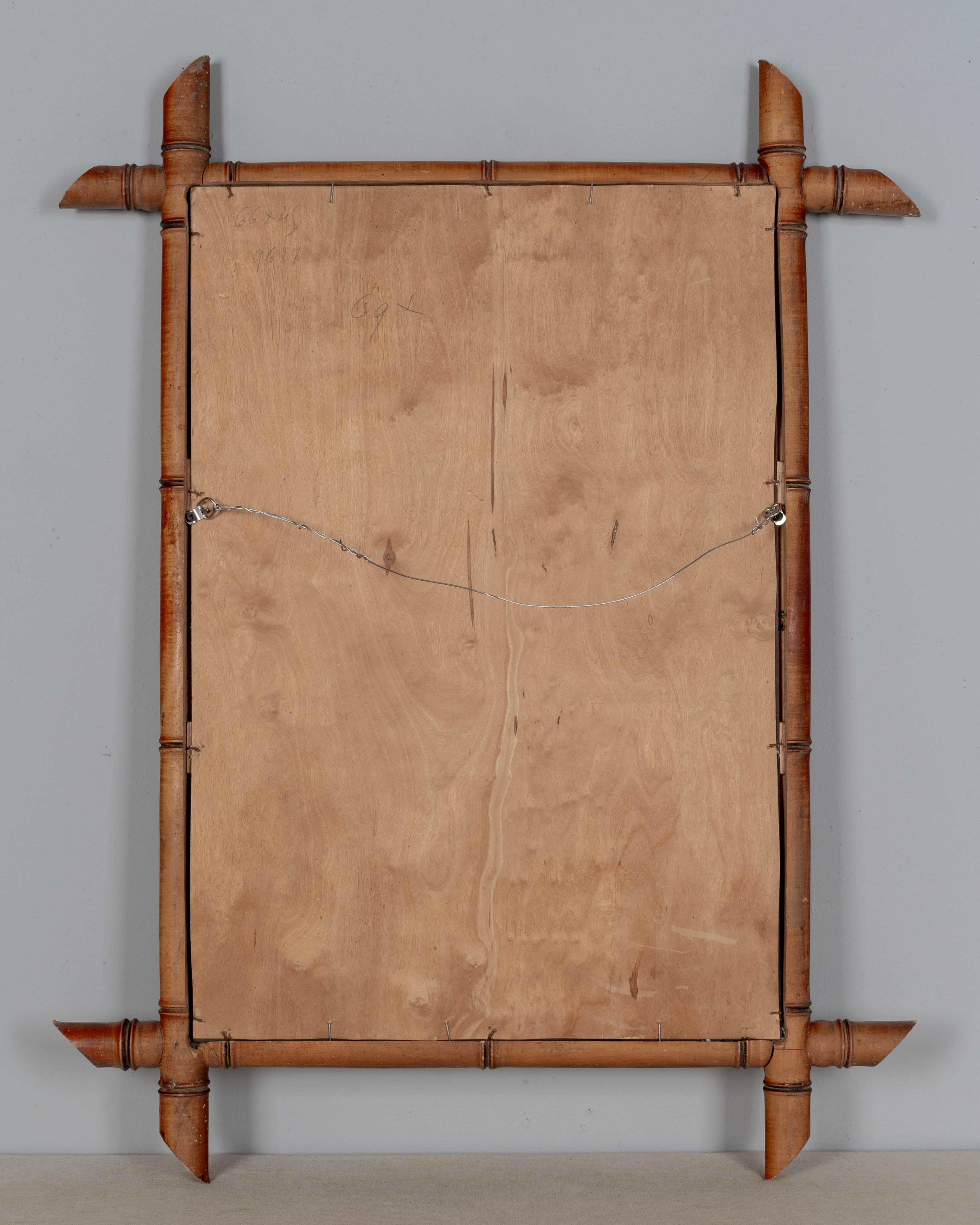 XX secolo Specchio francese in finto bambù e legno di ciliegio in vendita