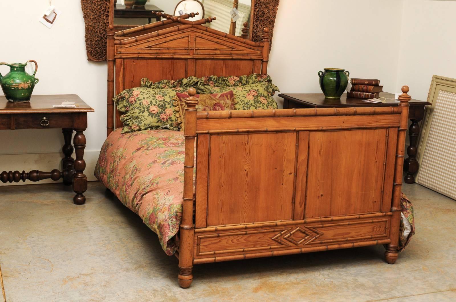 A French faux-bamboo bed from the second half of the 19th century with custom mattress, which is sized at 48.5 inches by 74 inches. This French bed was born in the later years of the reign of Emperor Napoleon III, at a time when France was entering