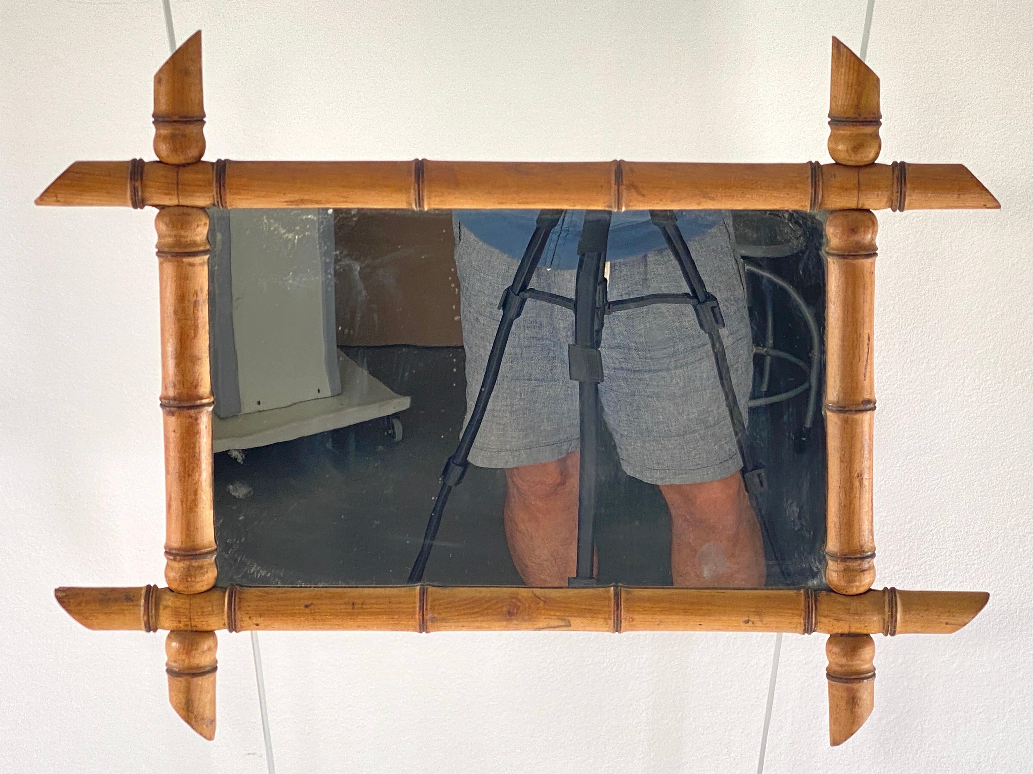 This mirror is in Faux bamboo. It has been made in france circa 19th century.
 