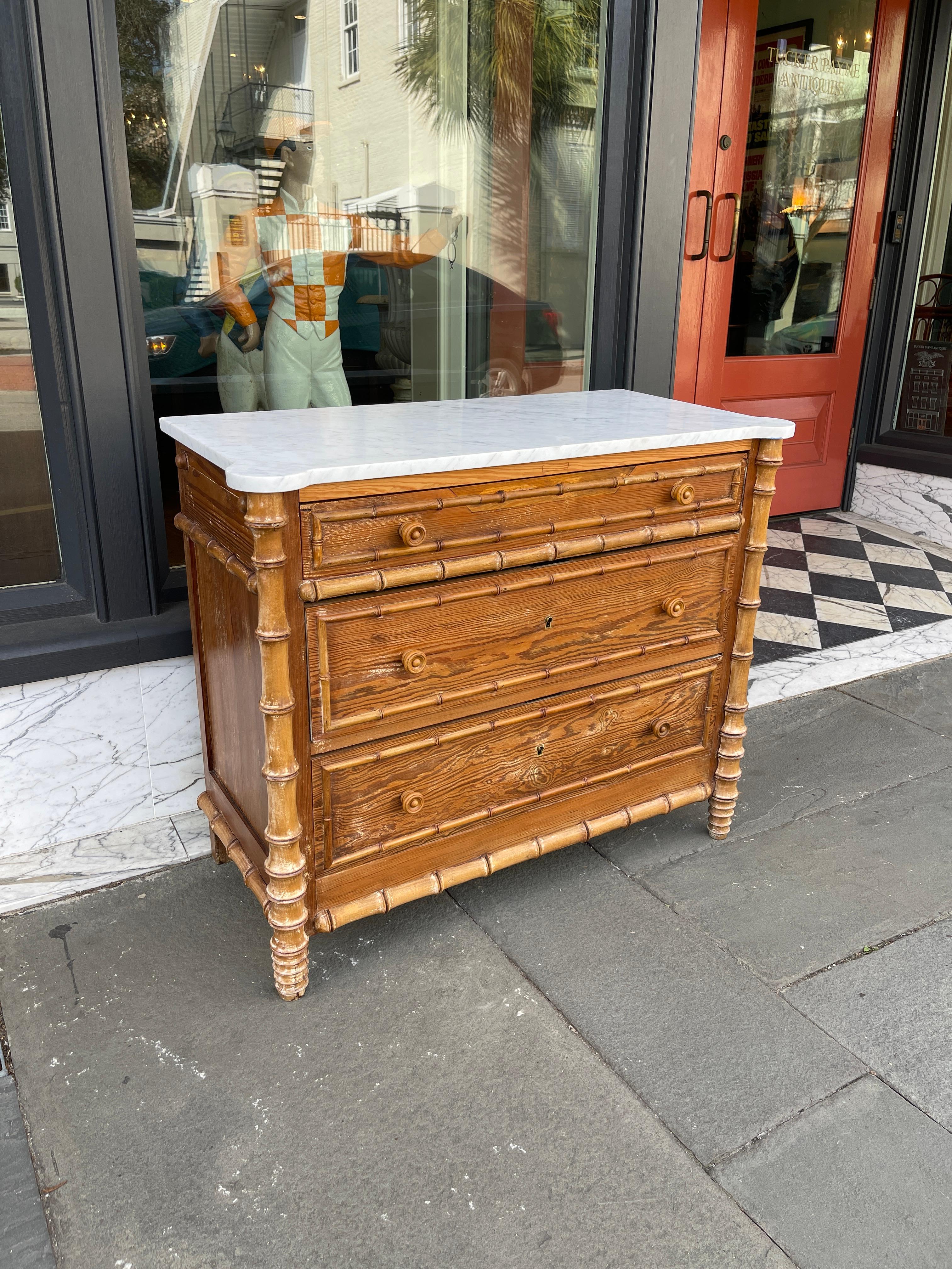 French faux bamboo marble top chest.
