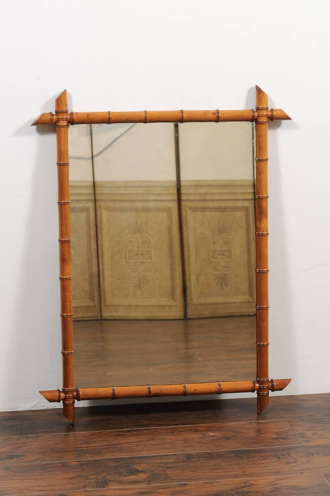 A French turned faux-bamboo rectangular mirror from the first half of the 20th century. In France, the taste for faux-bamboo dates back to the 19th century and becomes particularly popular during the Second Empire, in the second half of the century.
