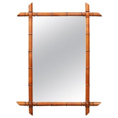 French Faux Bamboo Rectangular Mirror with Protruding Corners from the 1920s