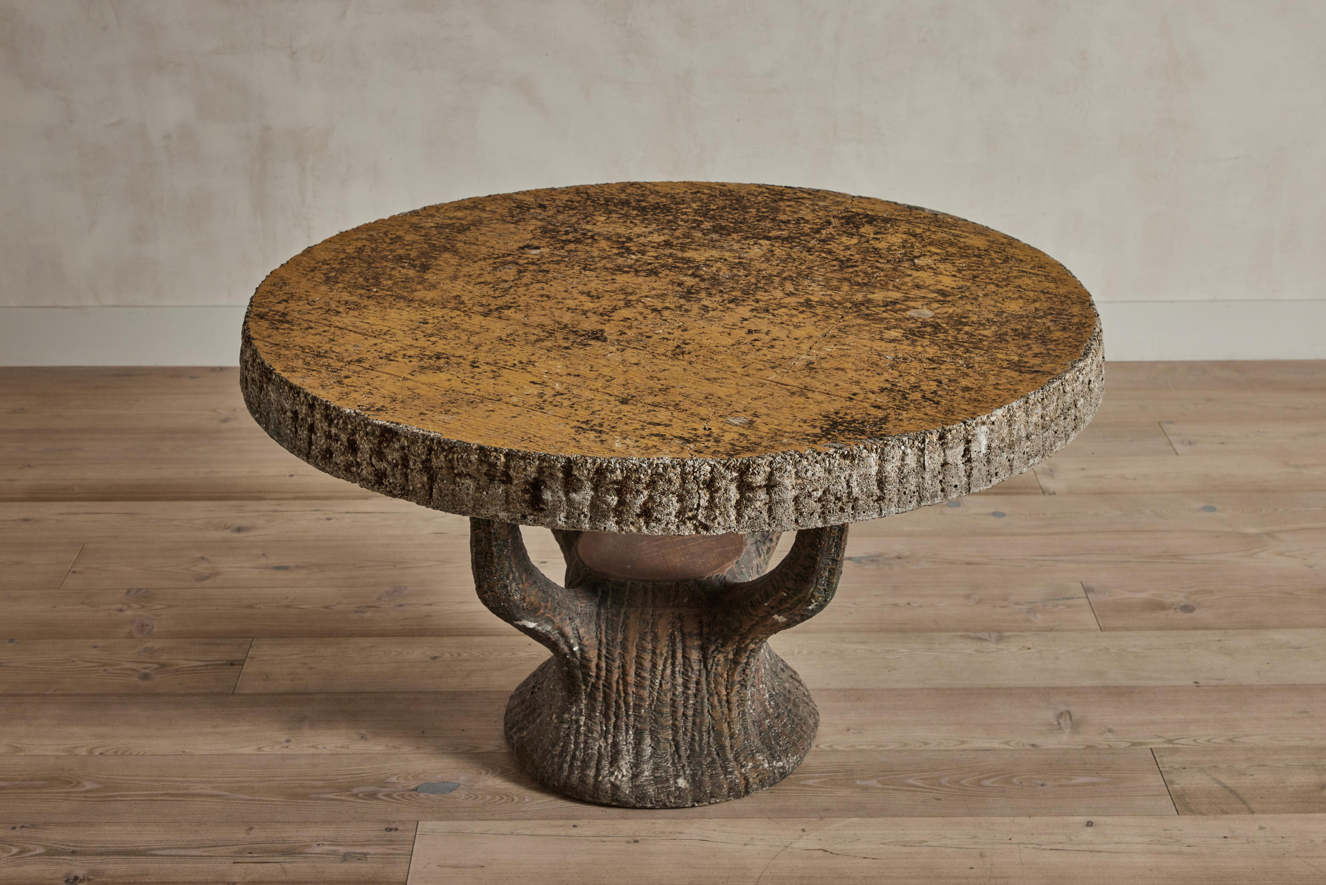 Concrete Faux Bois outdoor table from France circa 1930. Good vintage condition with some visible wear on concrete. Wear is consistent with age and use. 

