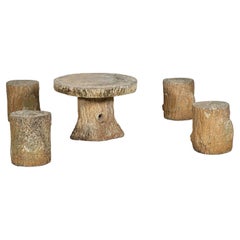 Ensemble table et tabourets de jardin en faux bois français