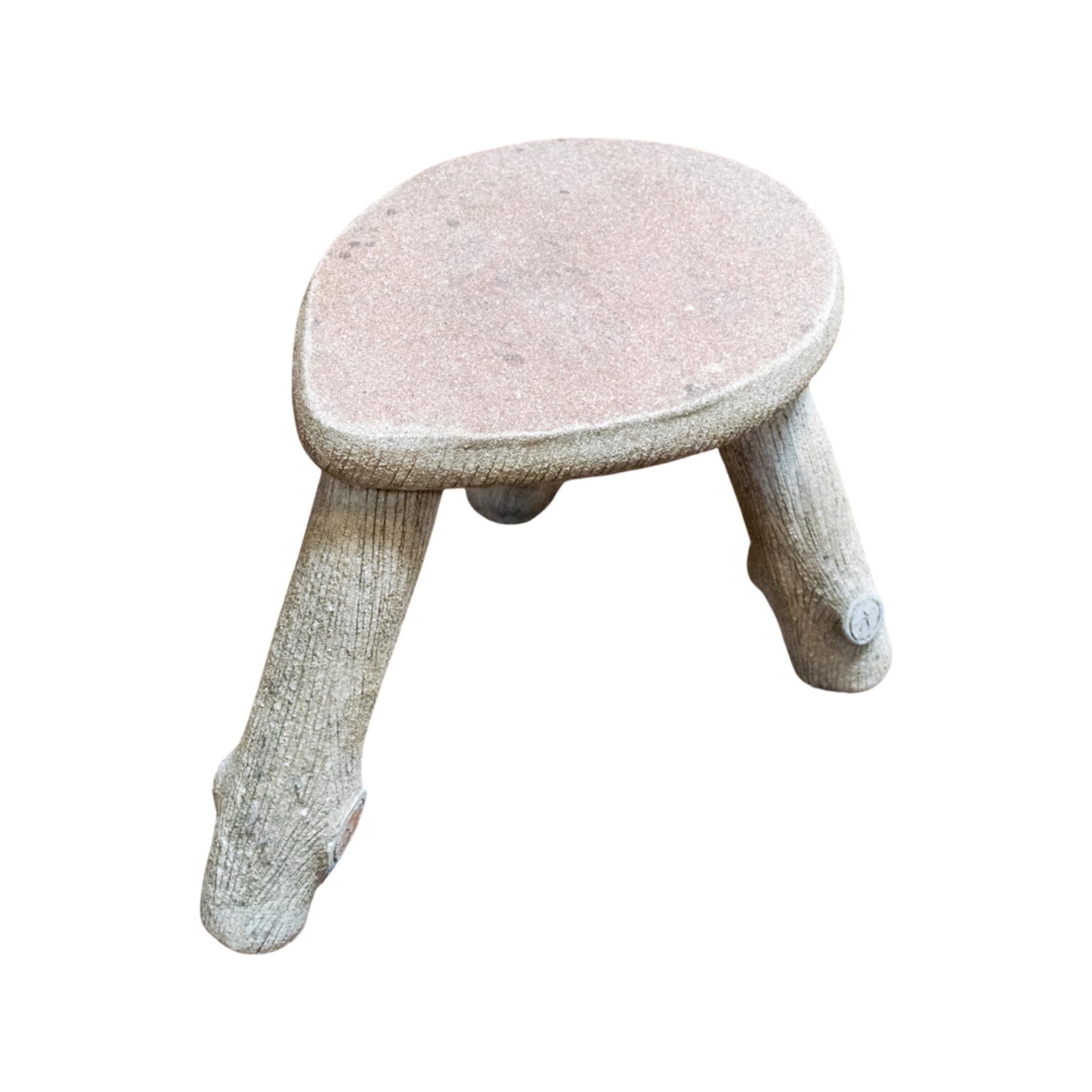 This 19th-century French Faux Bois Stool is the perfect addition to your garden exterior. Crafted with a unique process in France, it adds a timeless rustic charm to any outdoor setting. This sturdy stool is perfect for seating or display.