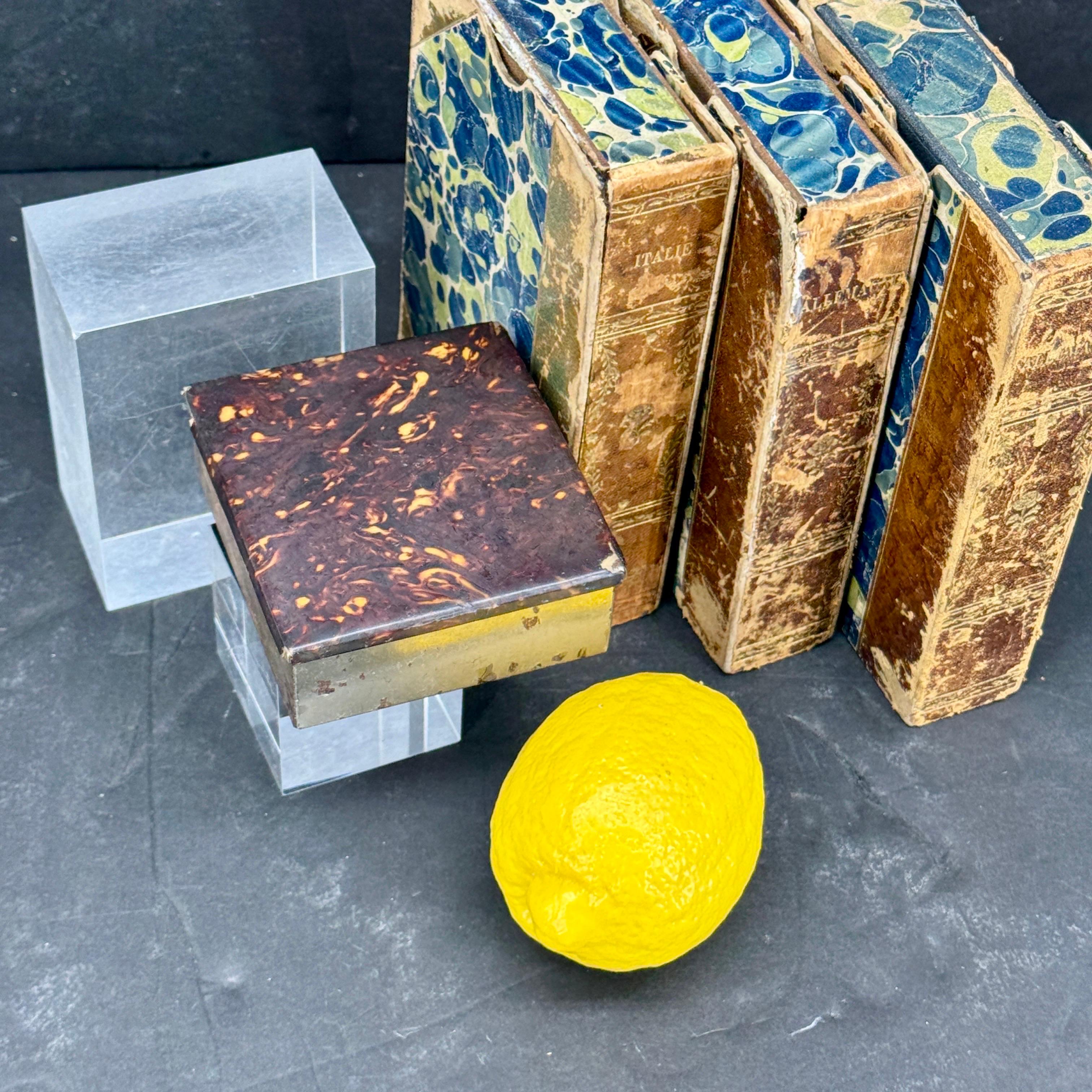 As found in Paris, a charming faux tortoiseshell box marked cigarettes on the lid. A very versatile piece that could stand alone on a cooffe or side table as well as hold treasures such tobacco, jewelry or trinket collectibles. The lid closes nicely