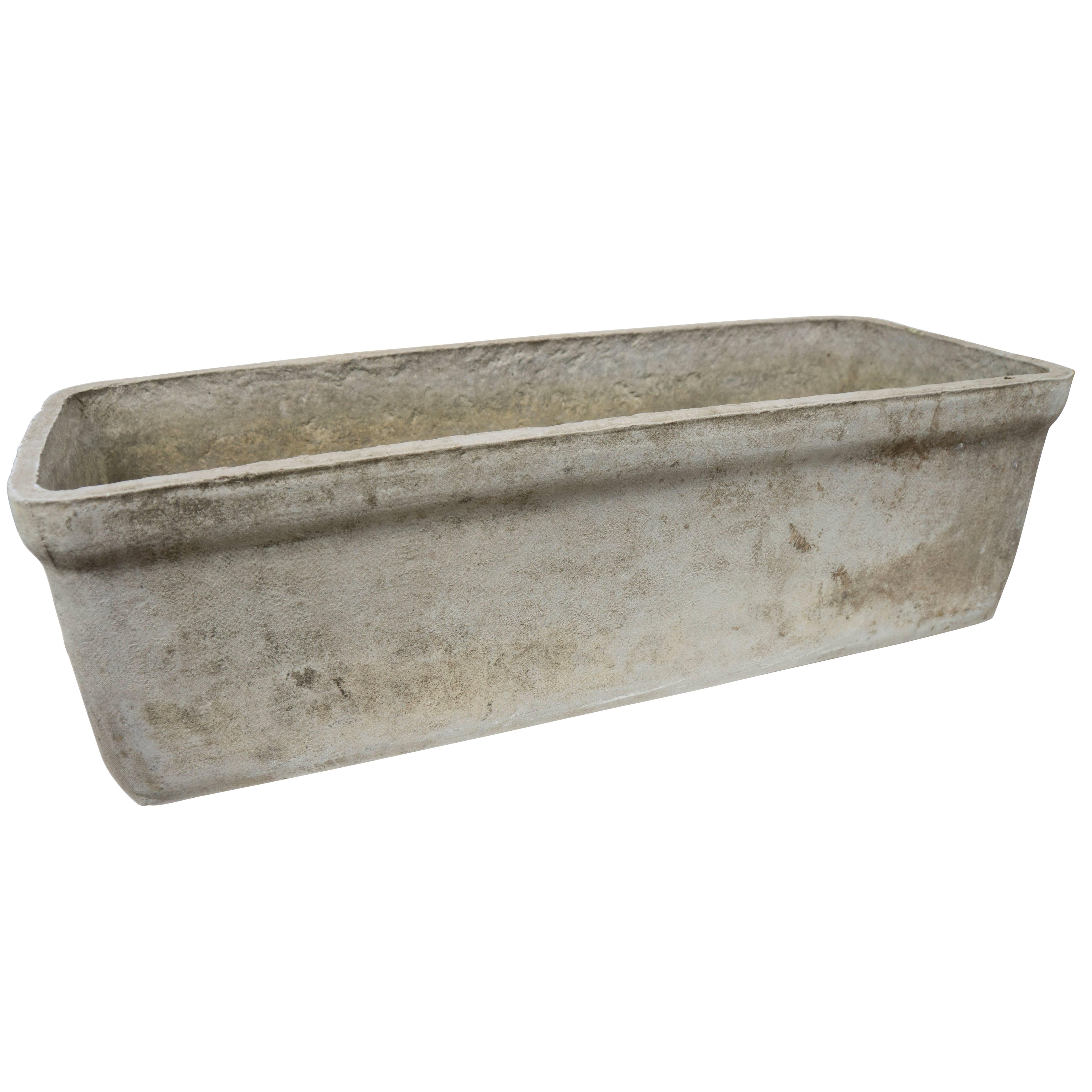 The French cement trough has a way of bridging the area between a floral arrangement and a setting that looks natural and chic. The washed out grey color is a natural patina that comes with age and use. A smooth blend tones ranging between greys and
