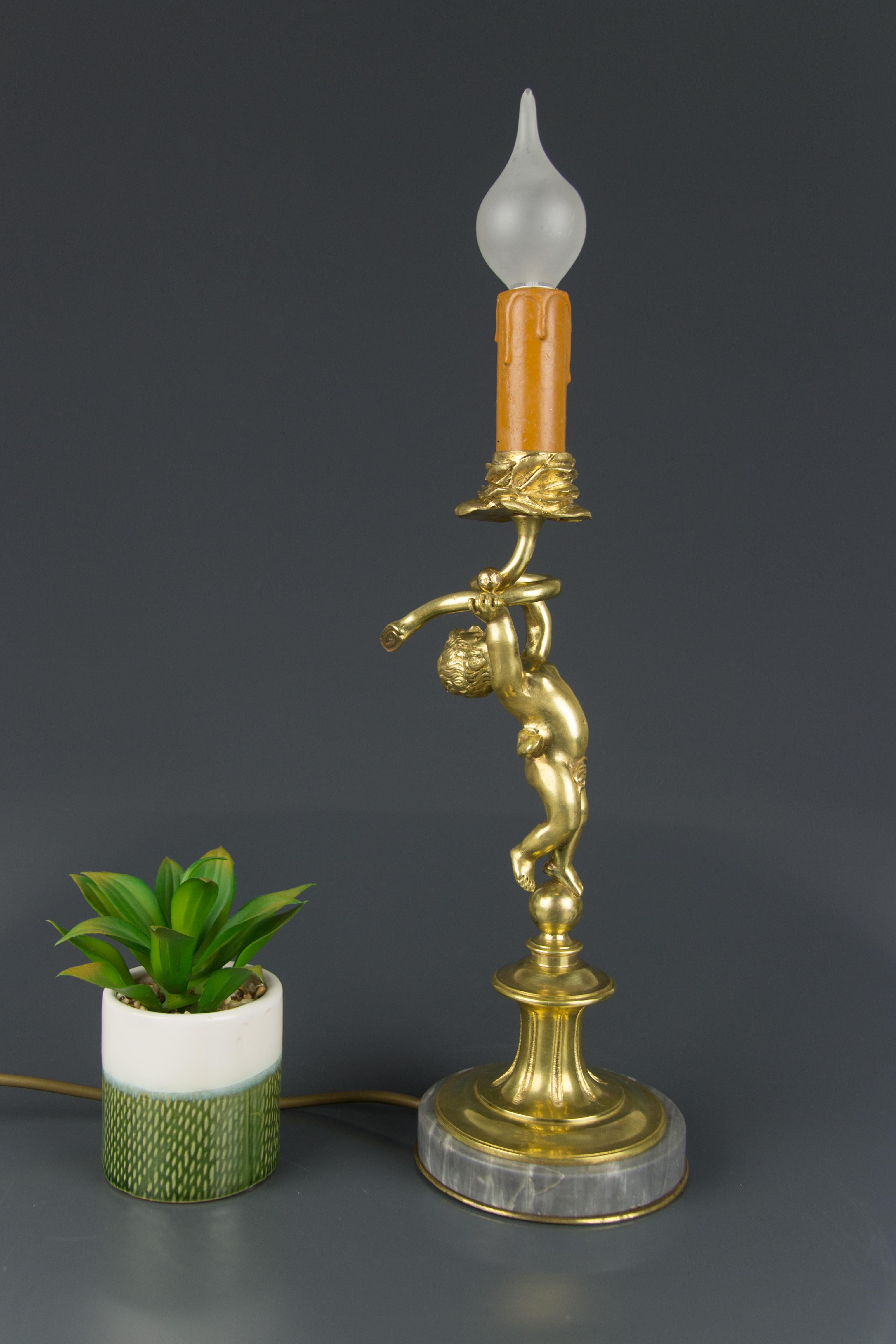 Early 20th Century French Figural Bronze and Marble Cherub Table Lamp, 1920s For Sale