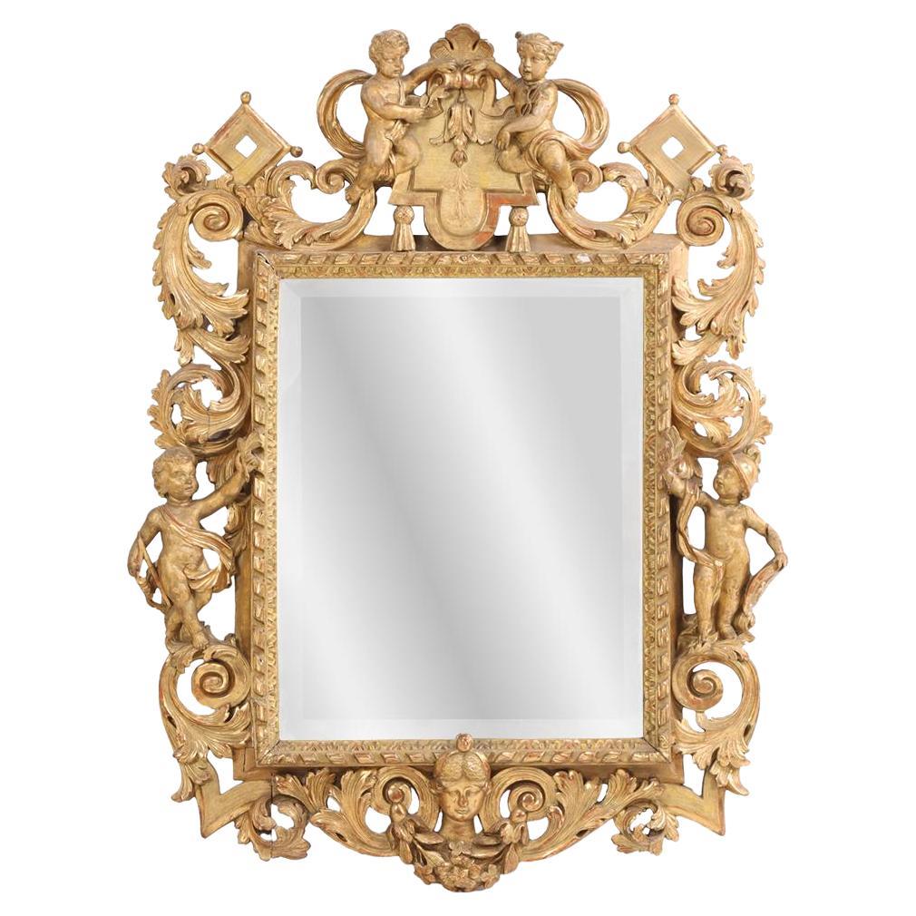 Miroir Figural en bois doré sculpté, C.I.C. 1860. en vente
