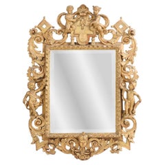 Miroir Figural en bois doré sculpté, C.I.C. 1860.