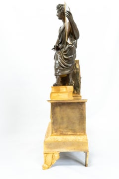 Eine restaurierte Patina und feuervergoldete Uhr mit der Darstellung von Virgil