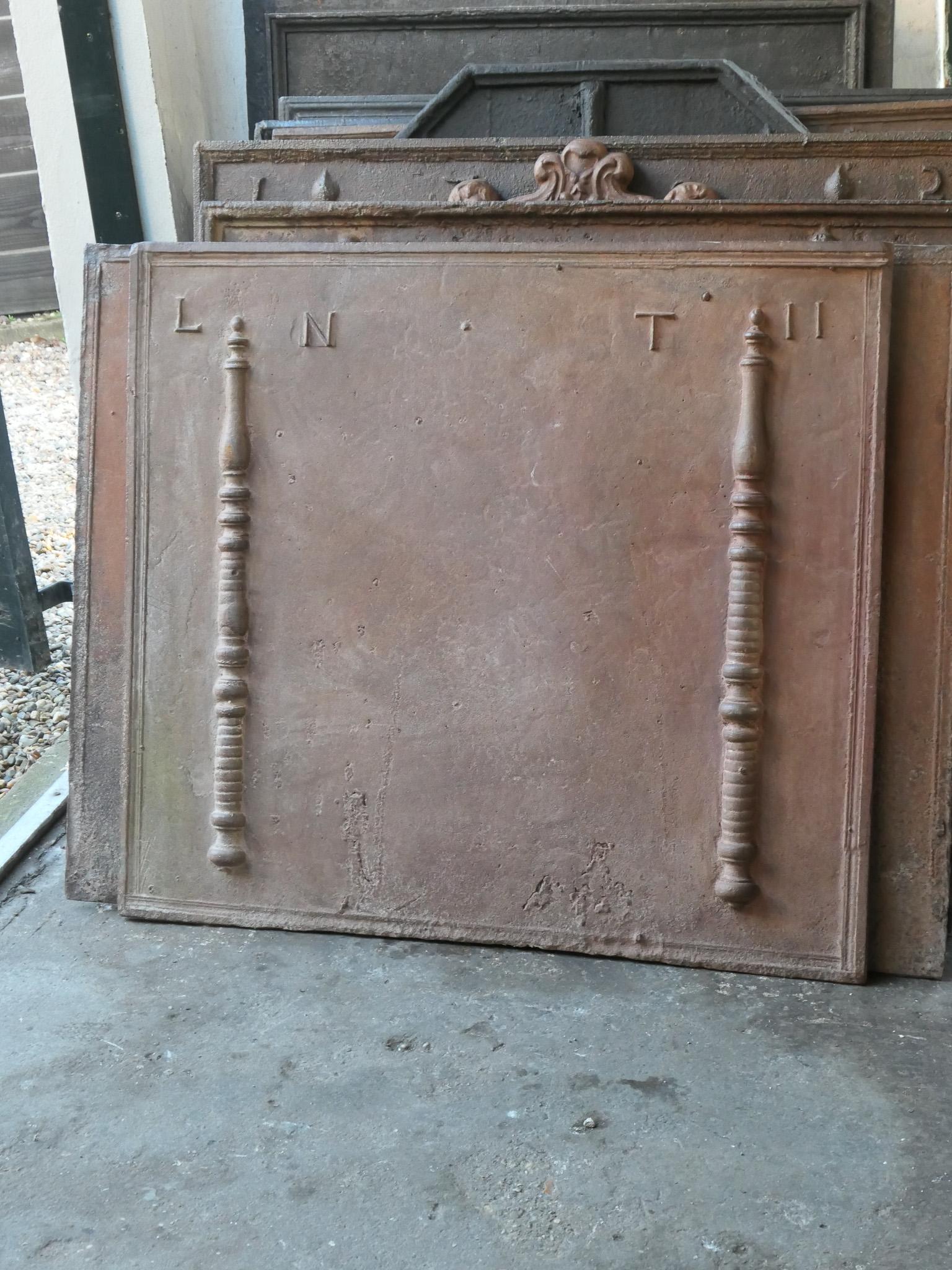 Cast Antique French Fireback / Backsplash with Pillars of Hercules, 18th Century For Sale