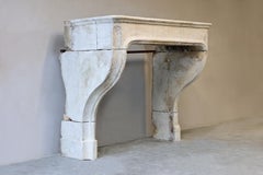 French Fireplace mantel of limestone, Louis XV, 19th century