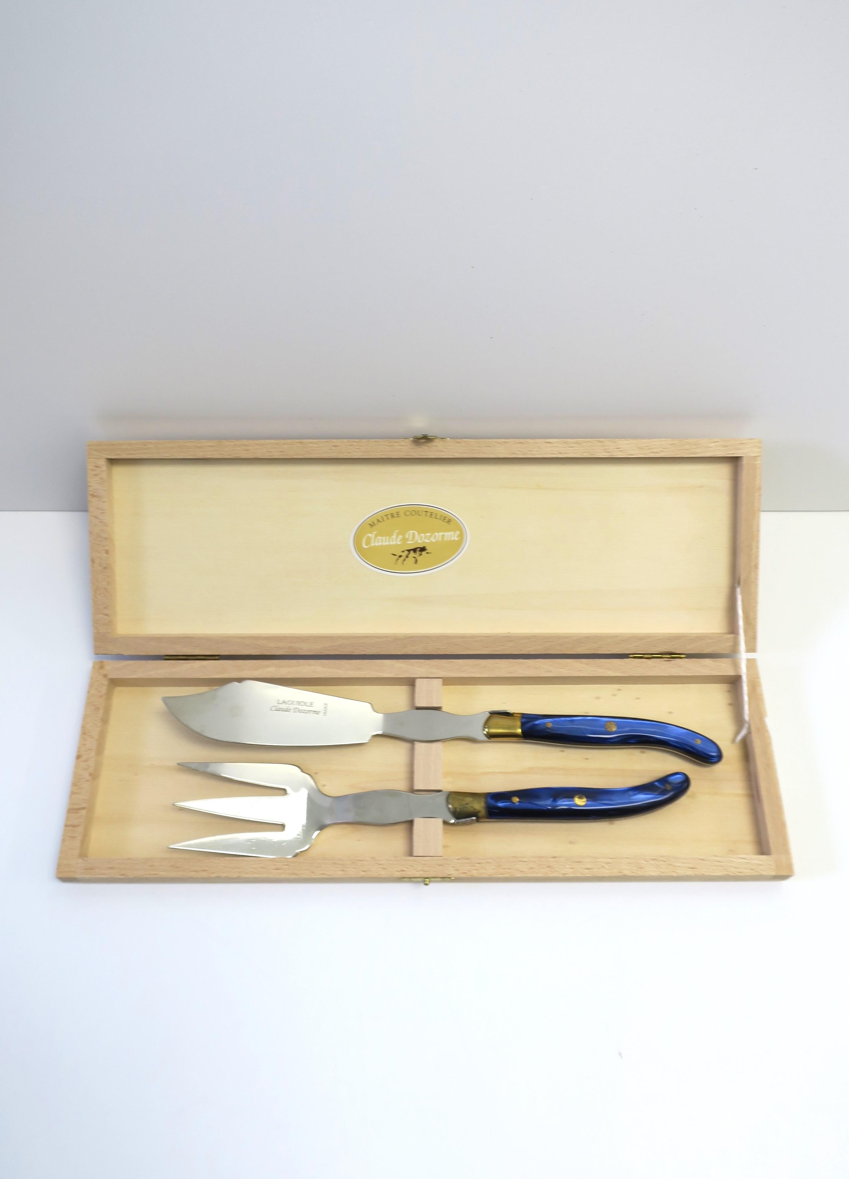 Französische Fisch Poisson-Gabel und Messer-Besteckservice, 2er-Set (20. Jahrhundert) im Angebot