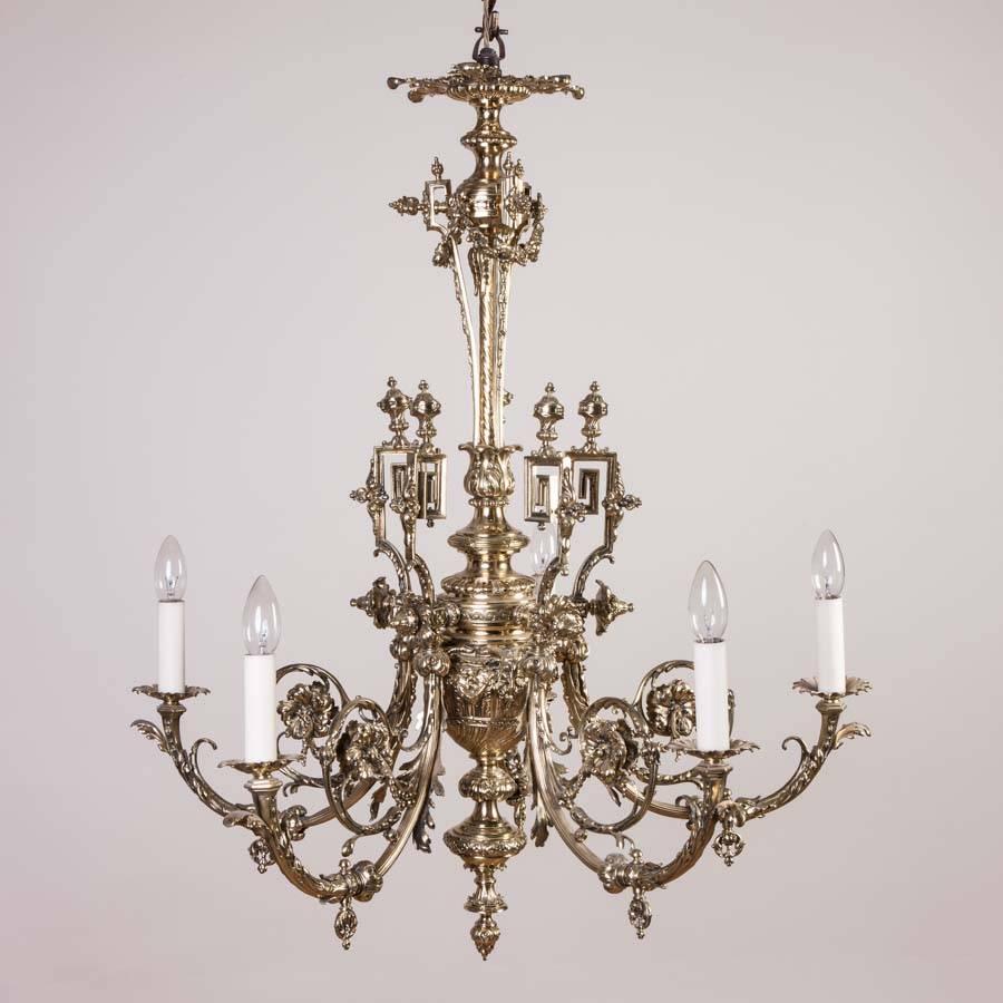 A 19th century ornate floral brass-work five-arm gasolier, converted to electricity.

Weight: 16 kilos (36 lbs).