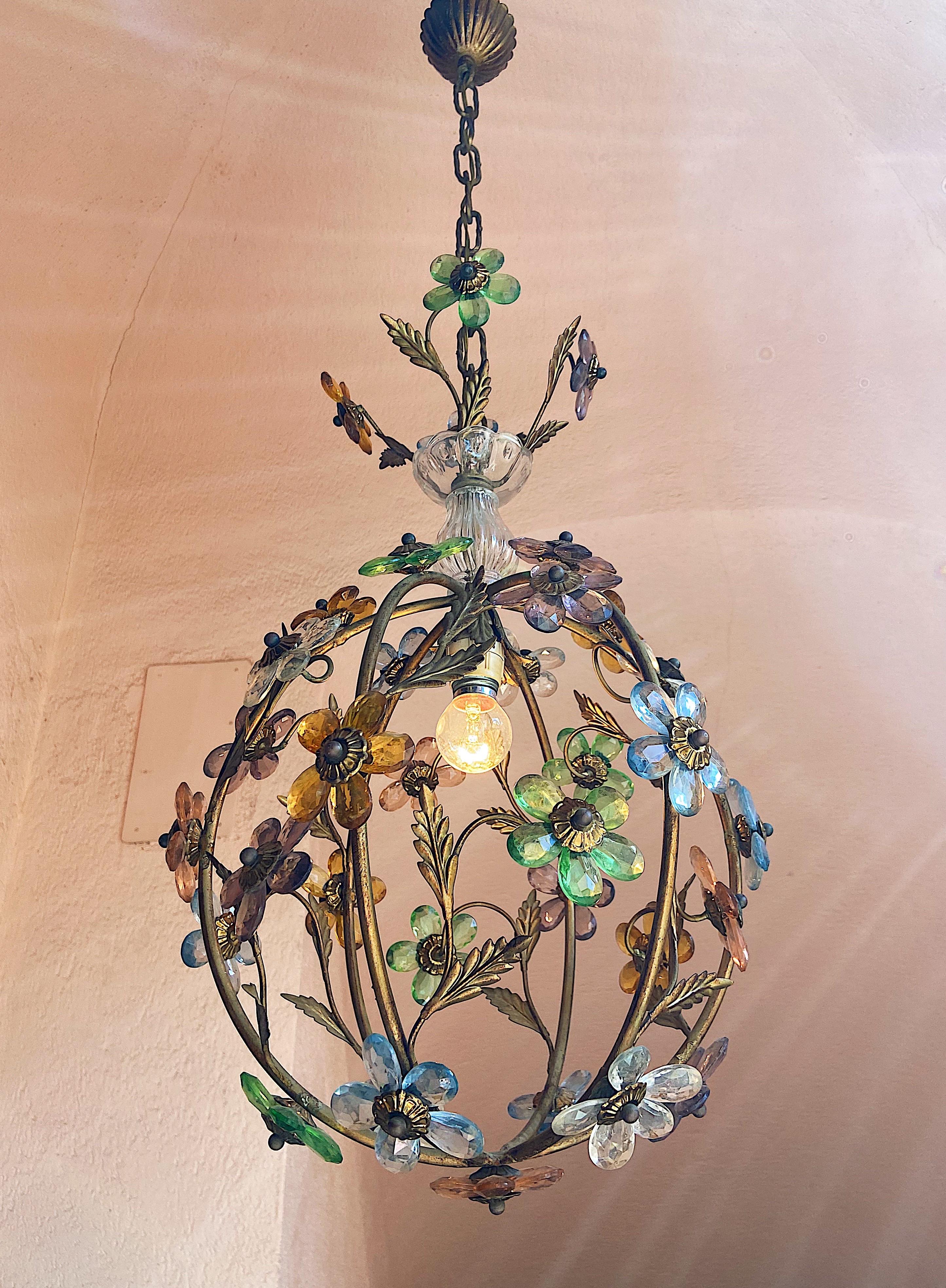 Vintage Murano glass flower chandelier attributed to Maison Baguès. Multi coloured glass flowers set on a bronze frame. This light will make any room blossom!

Details
Creator: Murano
Dimensions: height without chain 55 cm height with chain: 95