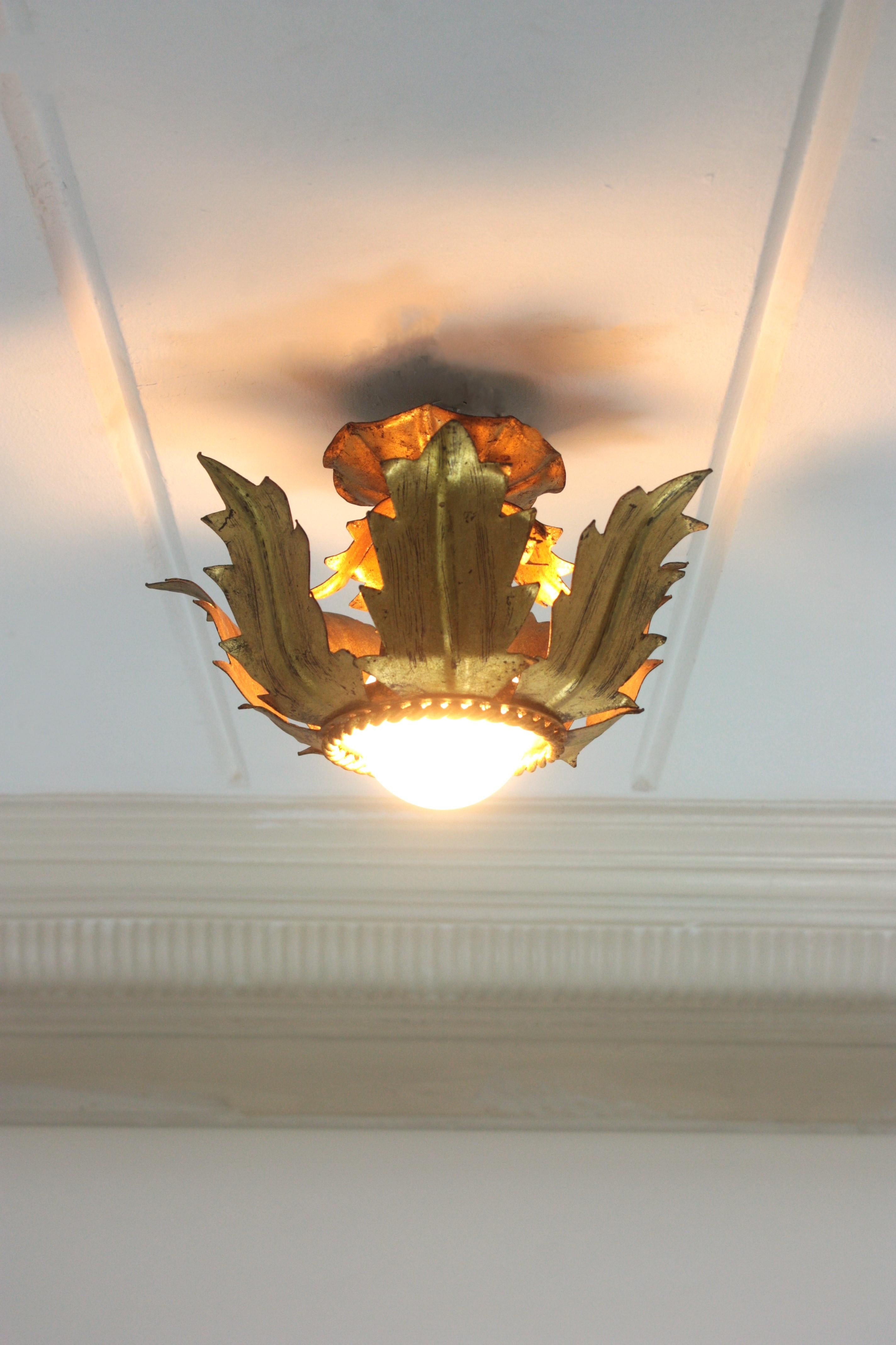 French Flower Bud Sunburst Light Fixture in Gold Leaf Gilt Iron In Good Condition In Barcelona, ES