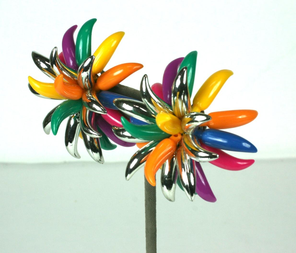 French flower spike multicolored resin and silver metallic clad earclips. Silvered metal clip back fittings. Huge striking scale.
Excellent Condition. Made in France
Length 2.75
Width 2.75
Height 1.75