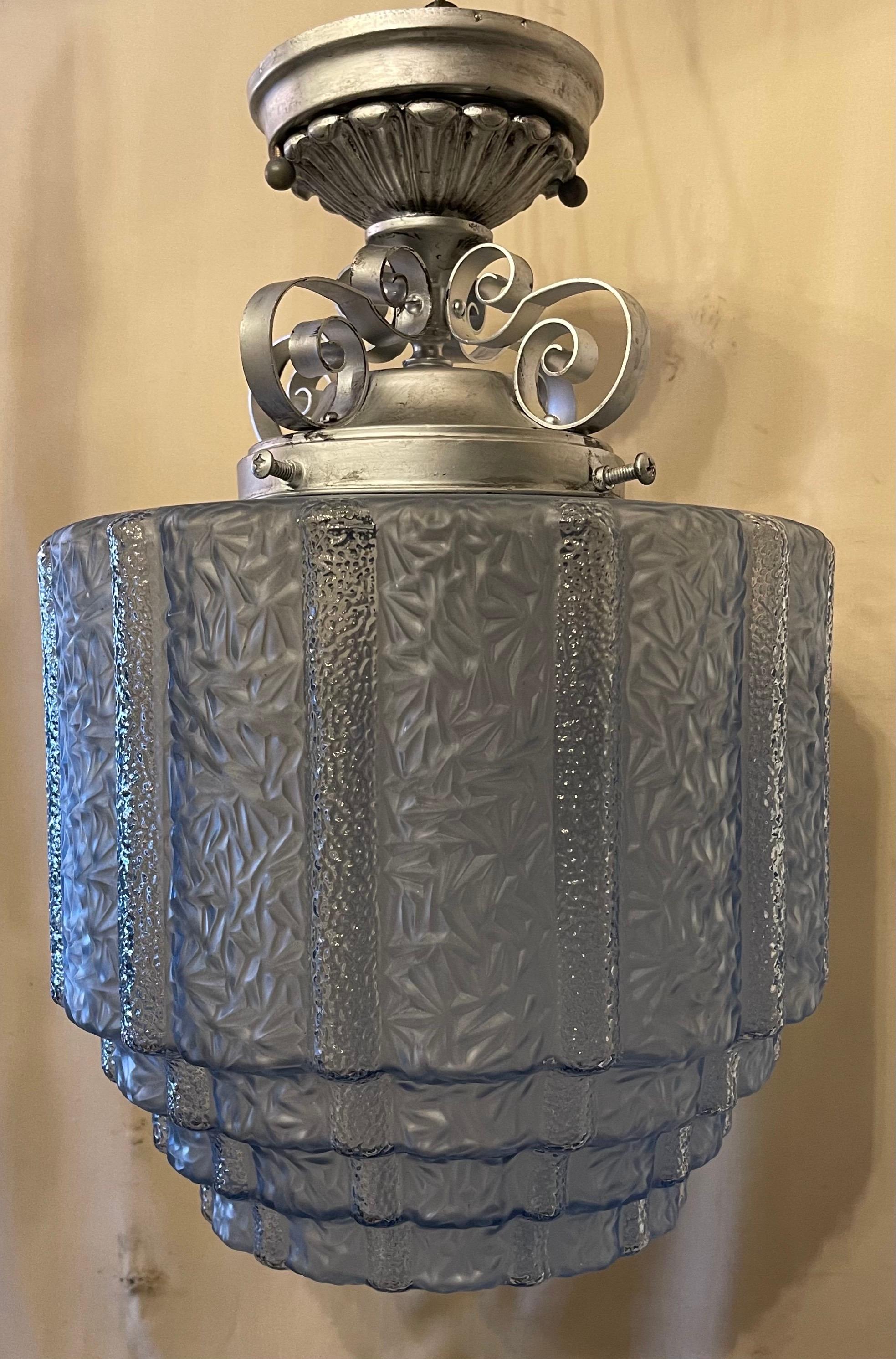 A Wonderful French flush mount Mid Century Modern, Art Deco frosted light blue glass With silvered metal lantern pendent fixture having an Edison light.
Ready to install with mounting hardware, and has been rewired.