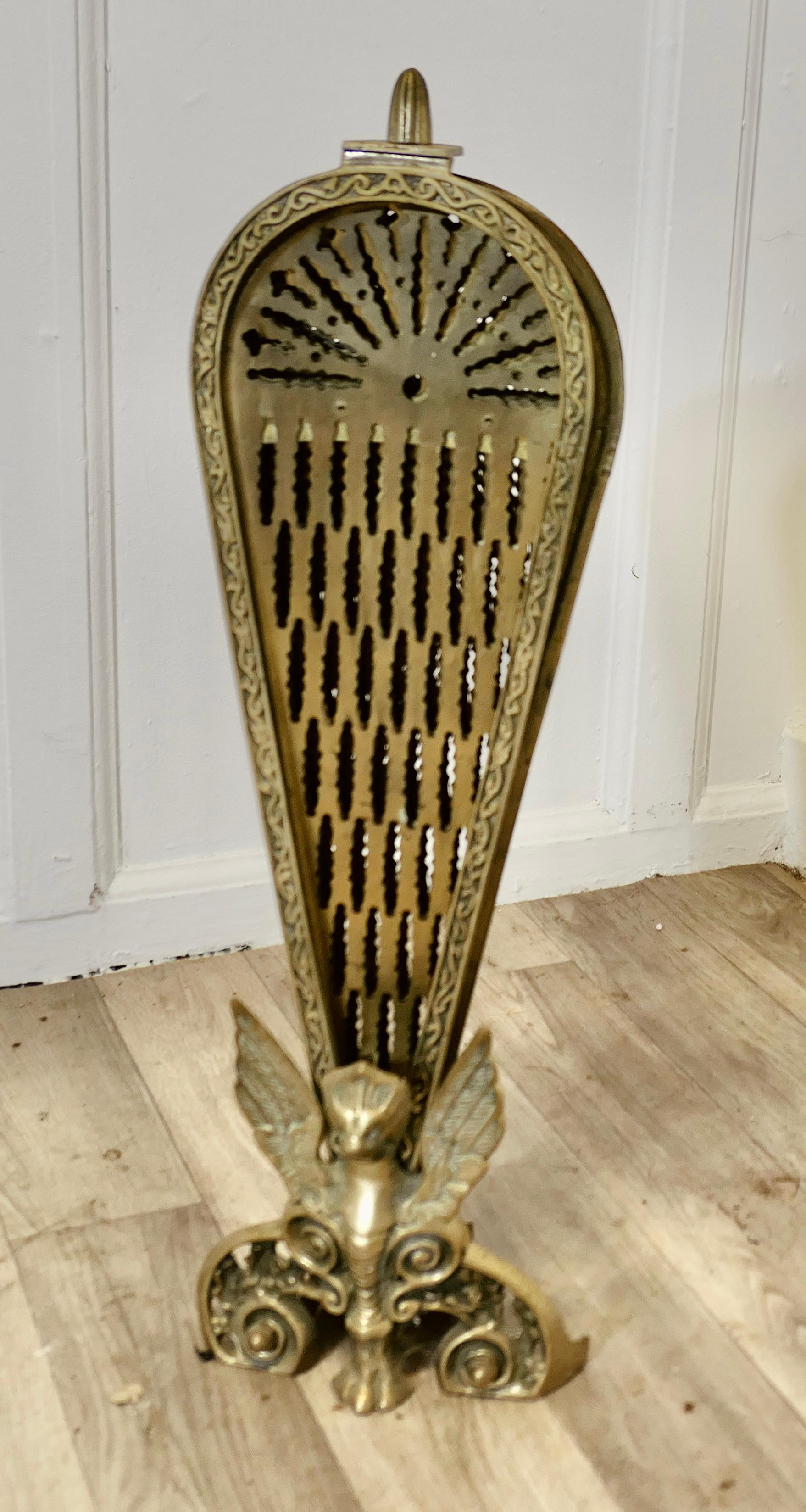 French Folding Brass Fan Fire Screen Peacock’s Tail Fire Guard

This is a very attractive piece, the screen can be folded flat and sits neatly in its stand when not required but when it is opened out the pierced Brass “Peacock Feathers” fan out to a