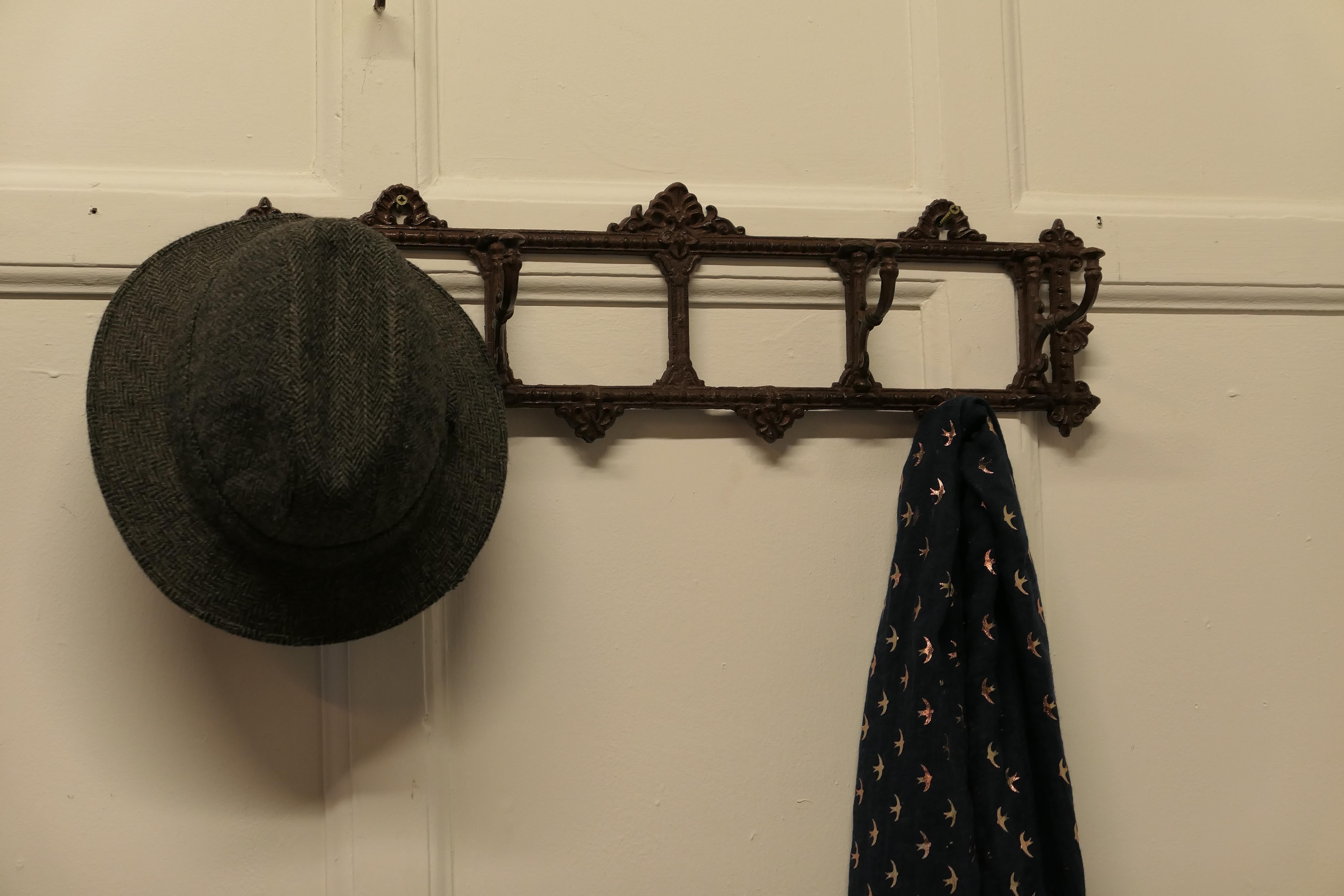 French Folding Coat Hook Rack  

A very unusual set, the wall rack has 4 complete fold flat hooks set on an iron frame, the coat hooks swivel independently of each other from flat to any angle 
The rack is a very useful piece it is in good condition