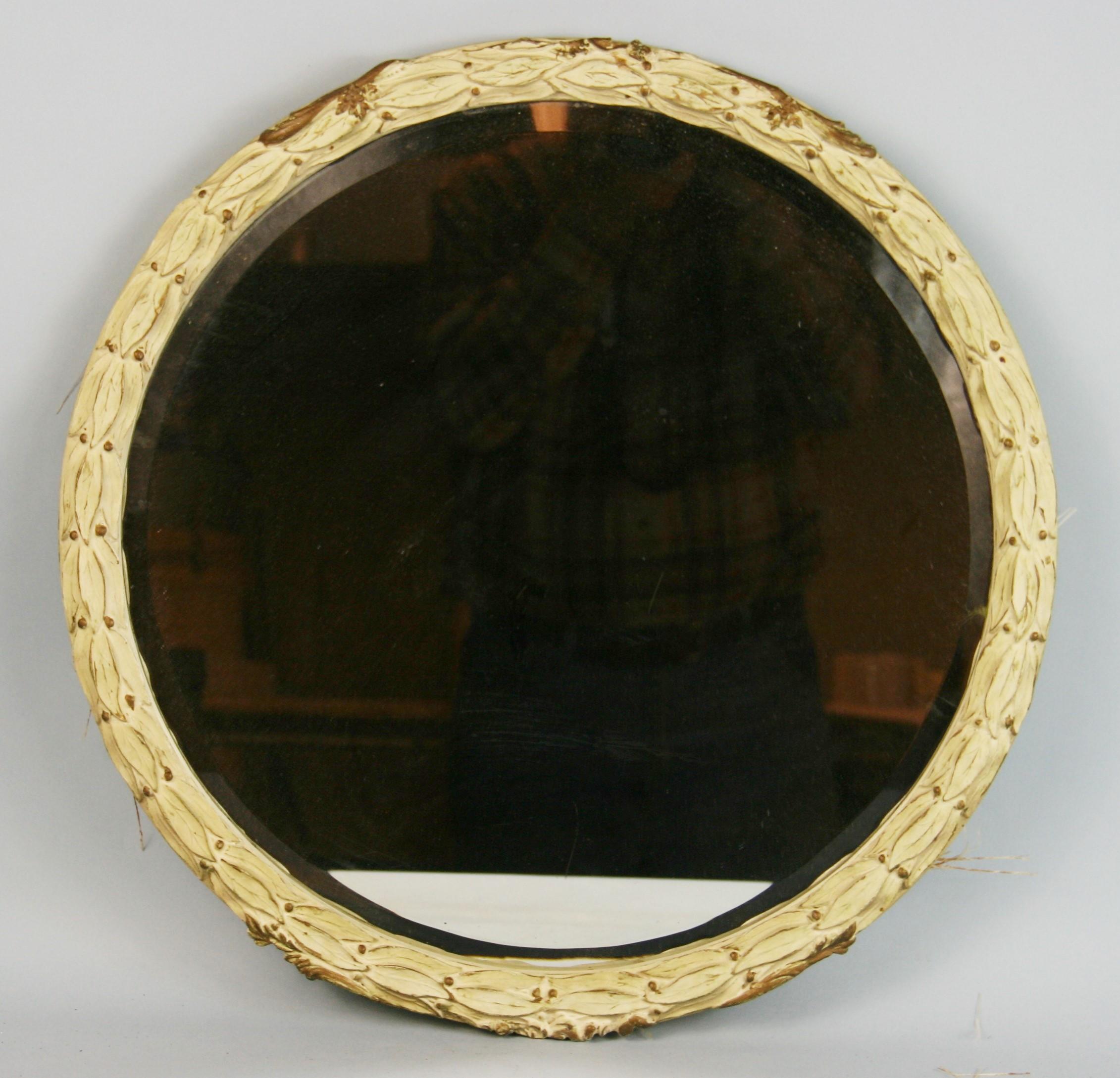 3-553 French foliate round beveled mirror.
