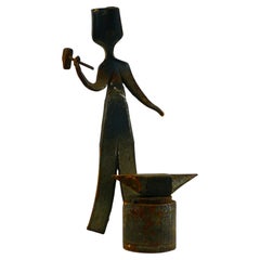 French folk art depicting a blacksmith at his anvil France 1960