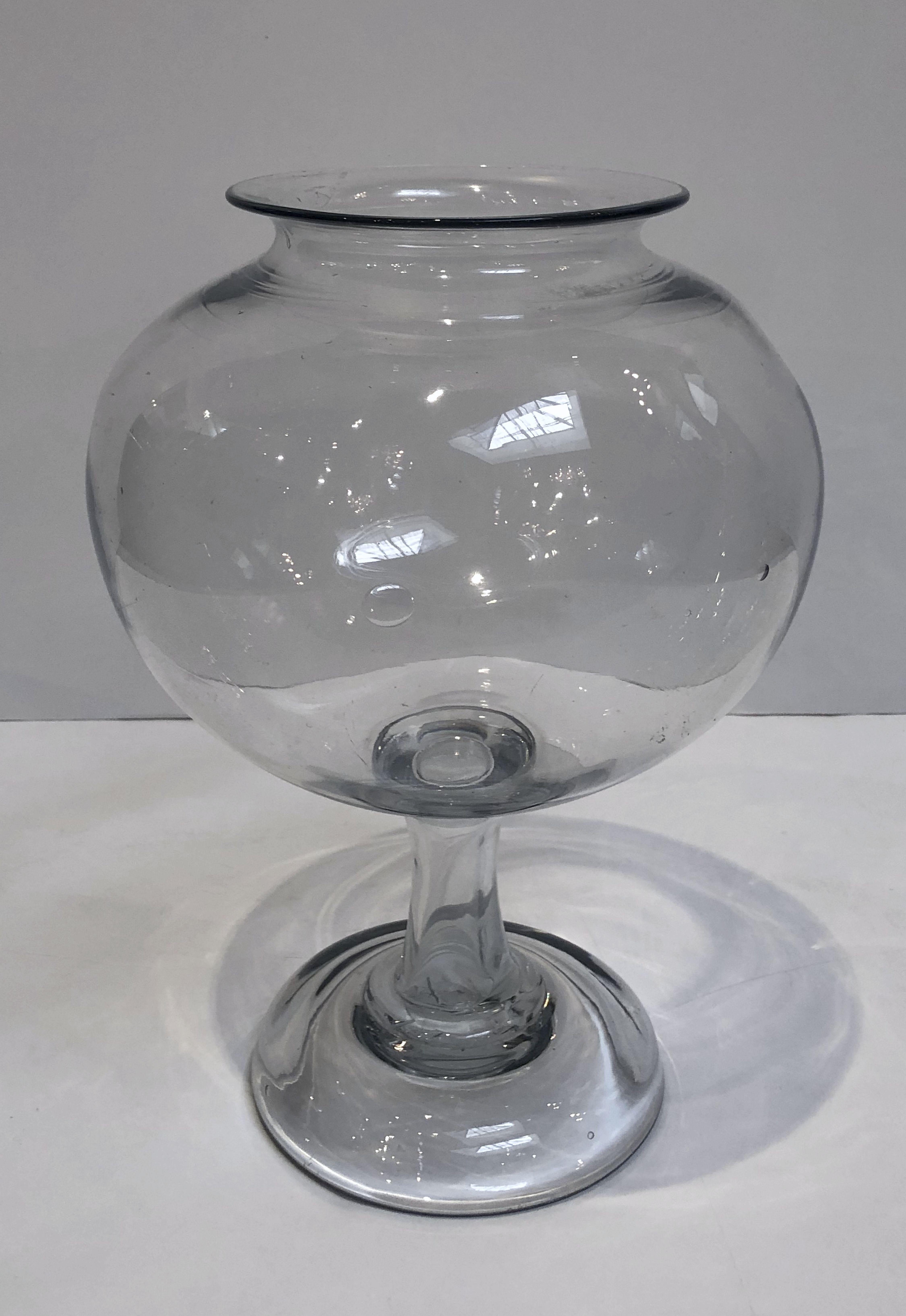 A French pharmacist's or medical doctor's jar for leeches or hirudines featuring a hand-blown glass footed bowl with raised lip opening.

The use of leeches in medicine dates as far back as Ancient Egypt. 
Leeches secrete an anticoagulant (known