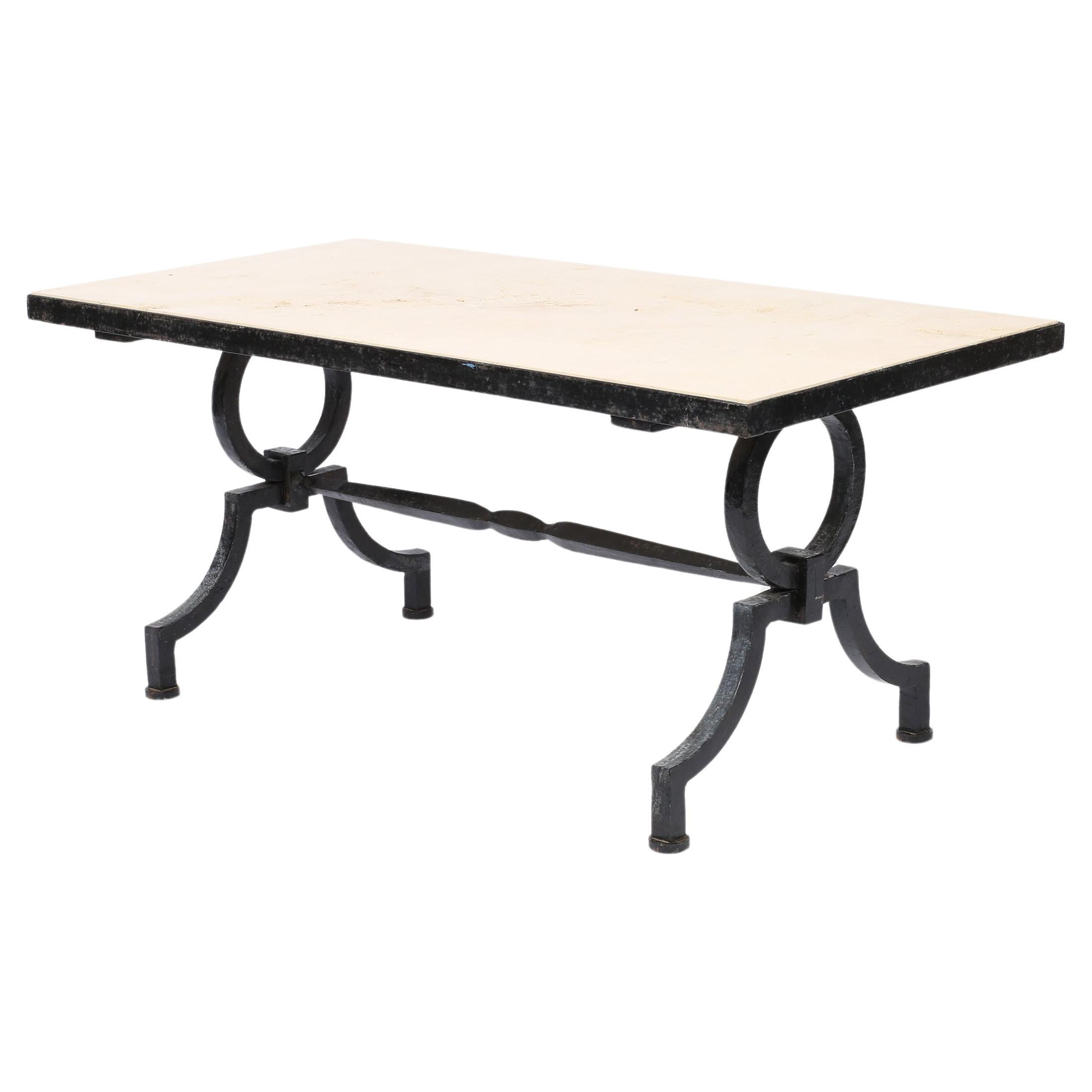 French Forged Iron and Limestone Coffee Table by Gilbert Poillerat, c. 1940.