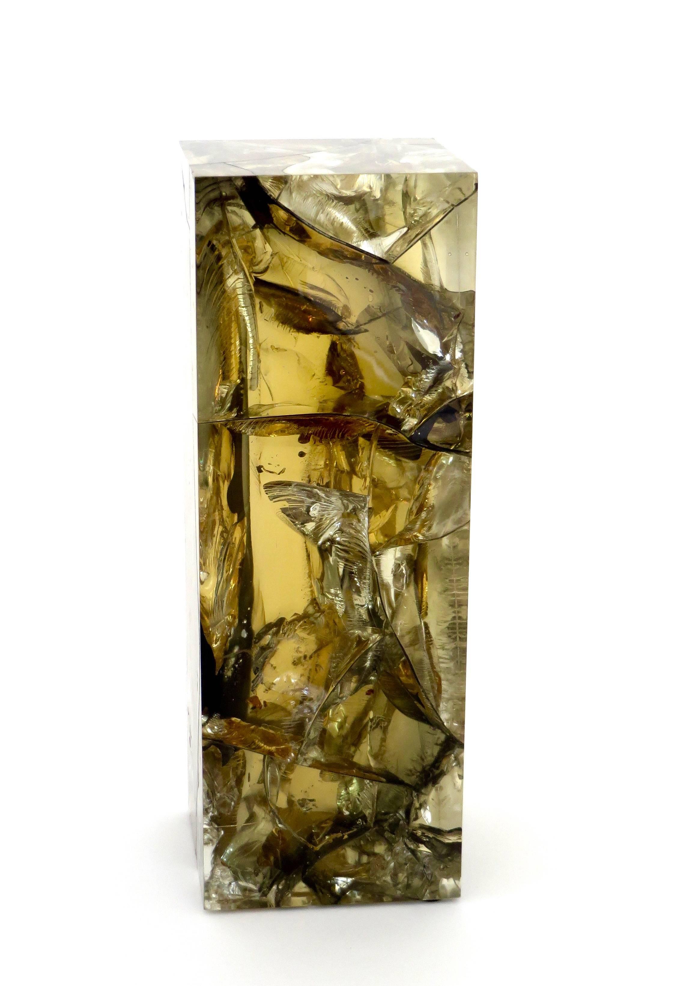 A rectangular fractal resin sculpture by French artist Pierre Giraudon in shades of gold, olive green, clear and black.
