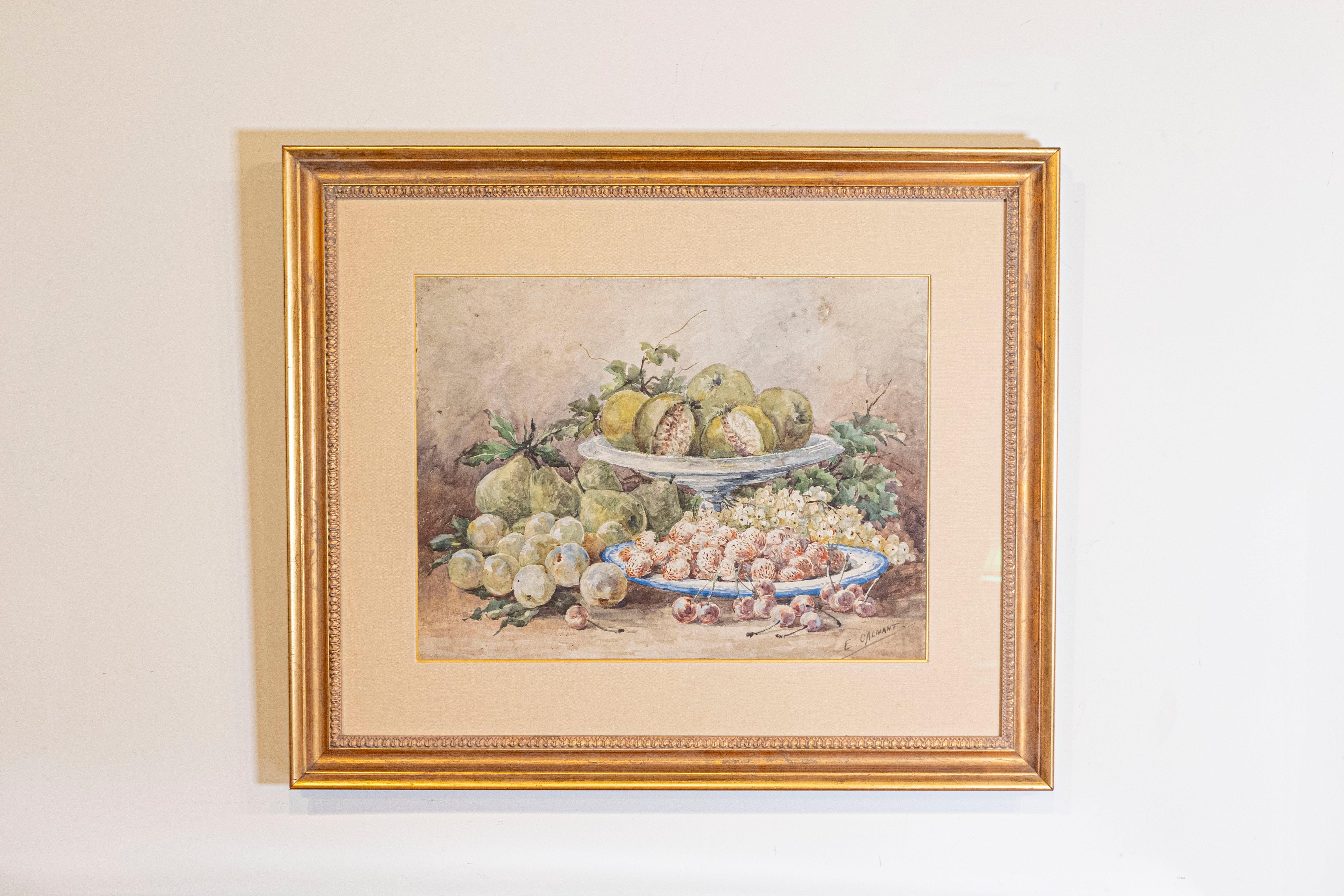 Ein französisches gerahmtes Aquarell aus dem 19. Jahrhundert, signiert mit E Calmant, das Früchte inmitten von Blättern zeigt. Dieses Werk, das in der zweiten Hälfte des 19. Jahrhunderts in Frankreich von der Aquarellmalerin Calmant geschaffen