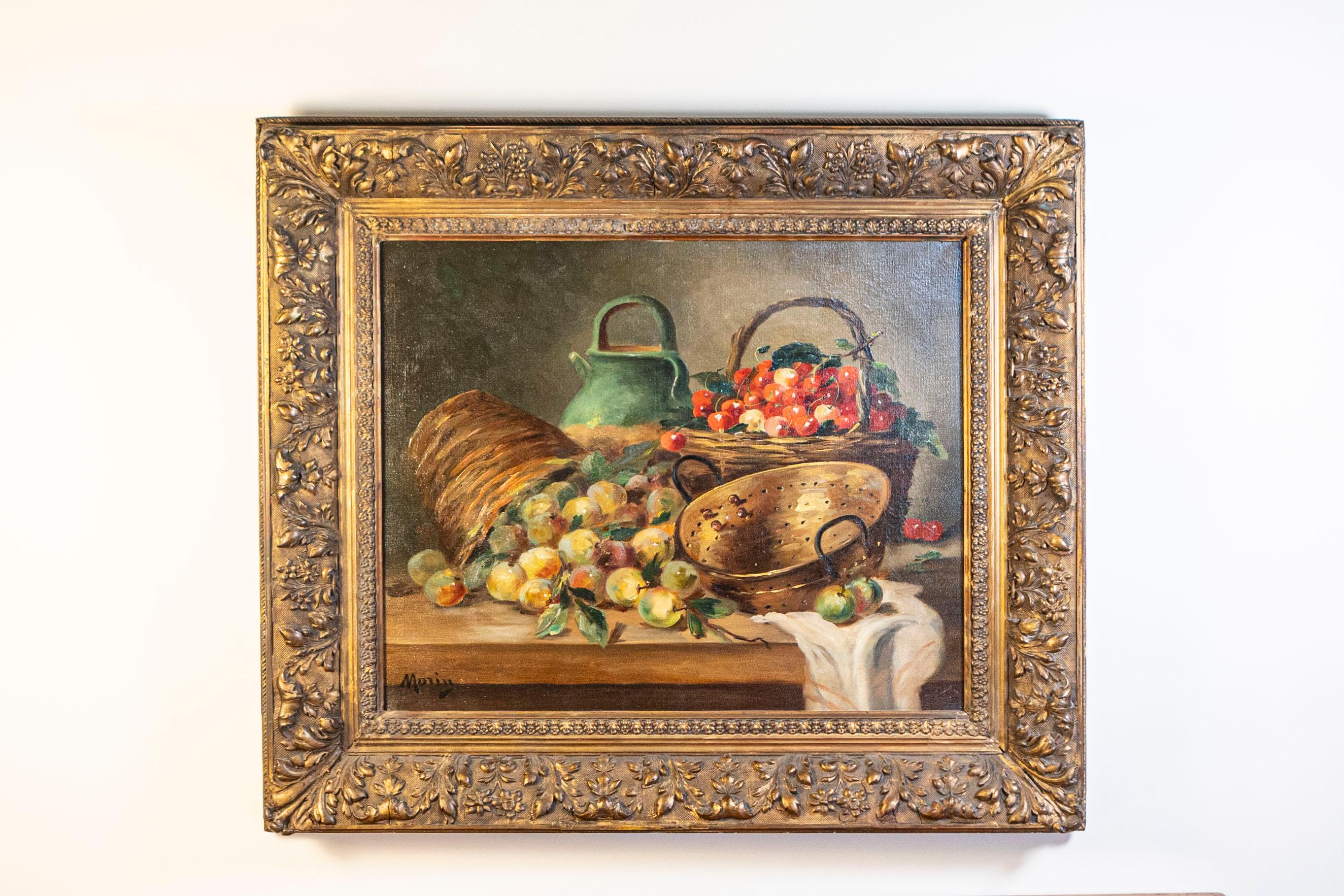 A French framed oil on canvas still-life painting from the 19th century depicting fruits, signed Morin. Created in France during the 19th century, this oil on canvas painting features mouth-watering cherries and prunes displayed in wicker baskets
