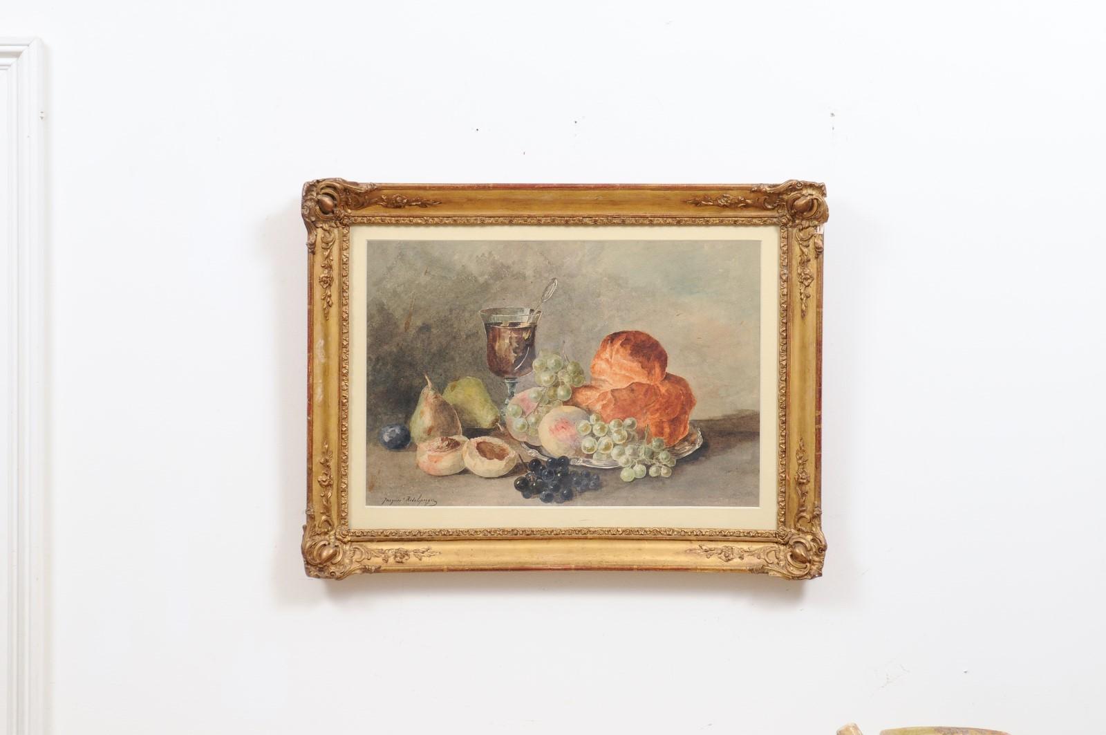 A French framed still-life watercolor from the late 19th century, signed Jacques Redelsperger and dedicated in the back. Created in France during the last quarter of the 19th century, this framed watercolor depicts mouth-watering fruits, a brioche