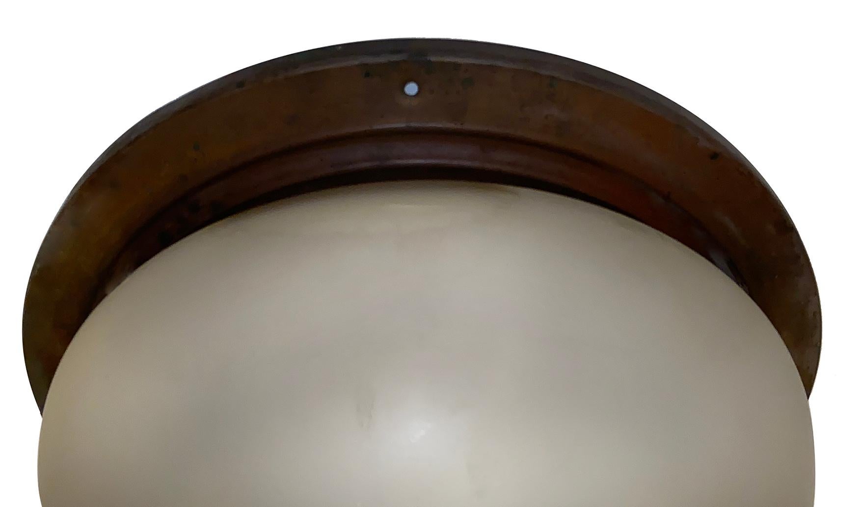 A circa 1920s French frosted glass light fixture with etched star pattern and patinated bronze body.

Measurements:
Height 9